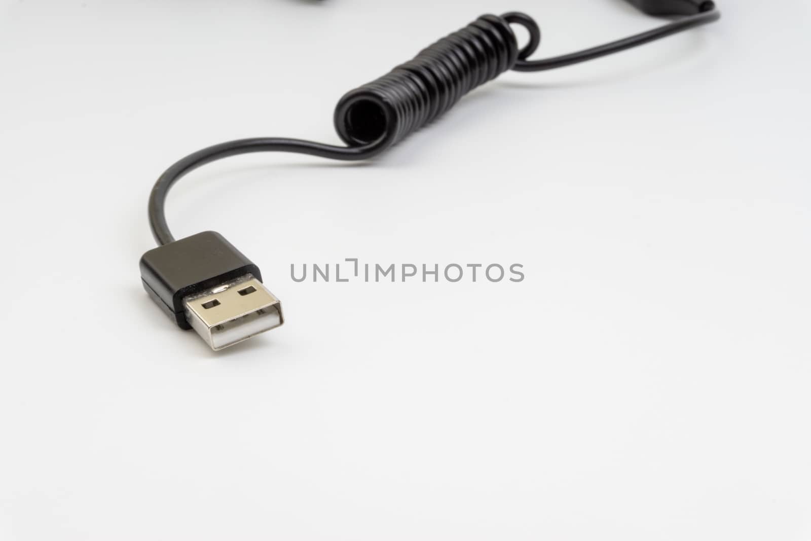 Universal recharger head or usb cable isolated on white background by silverwings