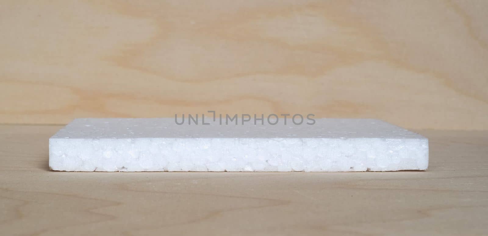 white expanded polystyrene plastic texture background by claudiodivizia