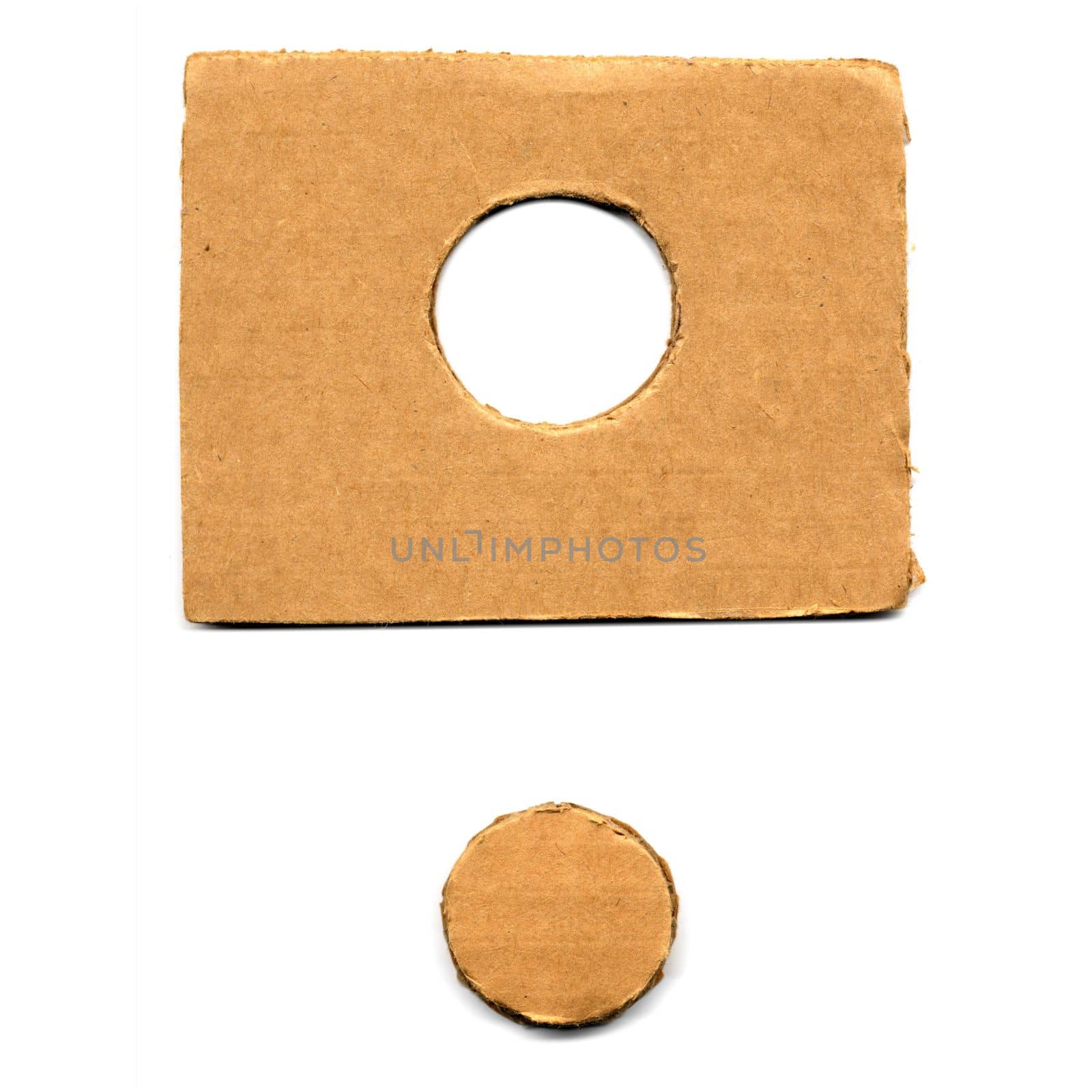 brown corrugated cardboard texture with hole and token useful as a background