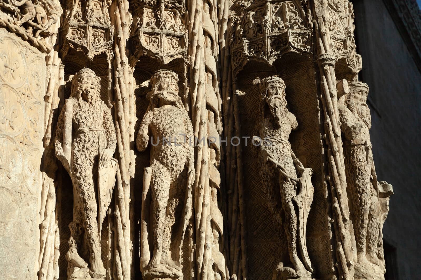 Valladolid, Spain - 9 December 2018: National Sculpture Museum, close-up view of the statues on main facade