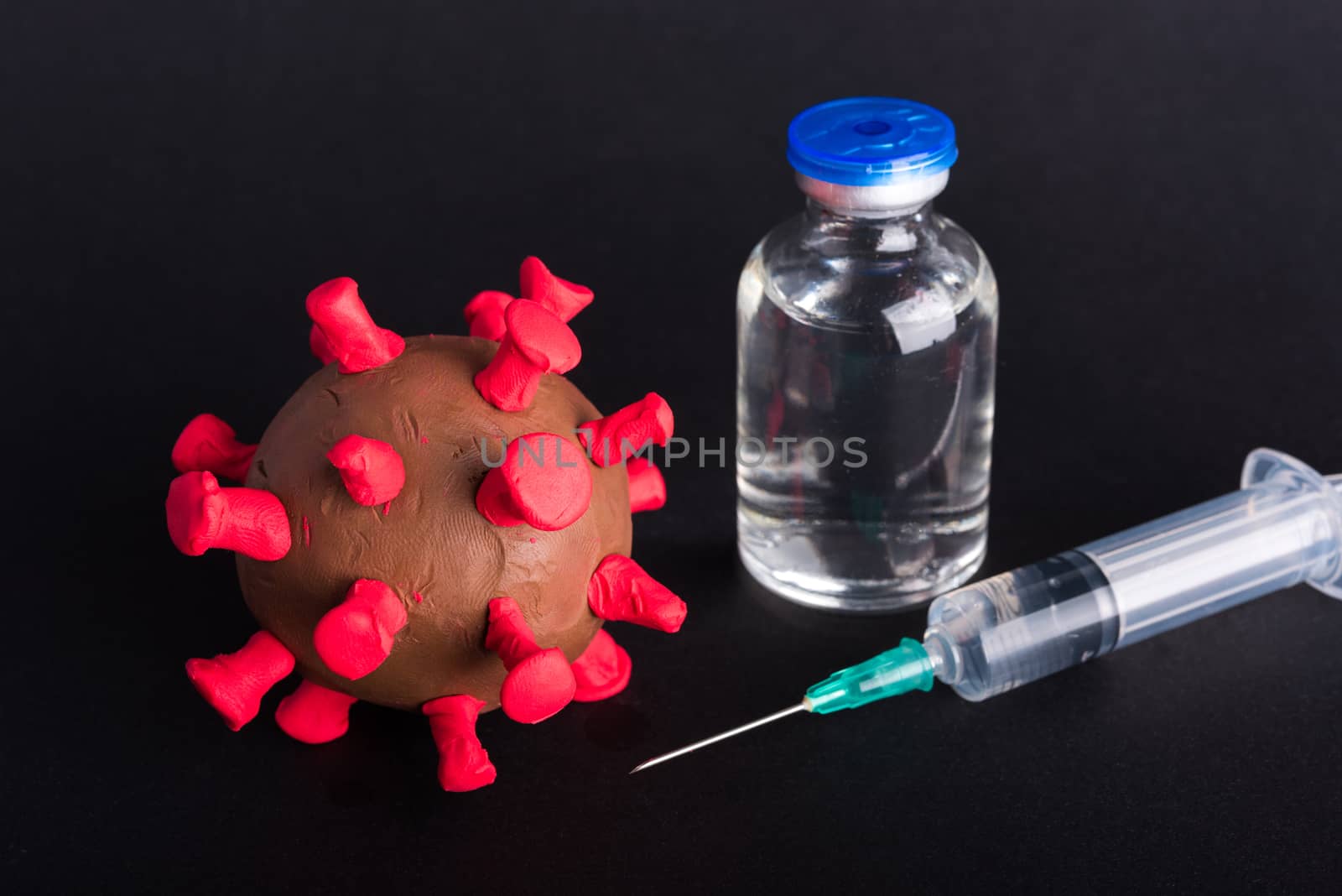 plasticine disease cells virus bottle vaccine and syringe by Sorapop