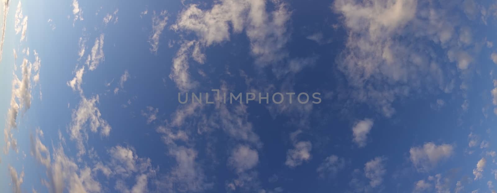 a blue sky full of beautiful clouds by devoxer