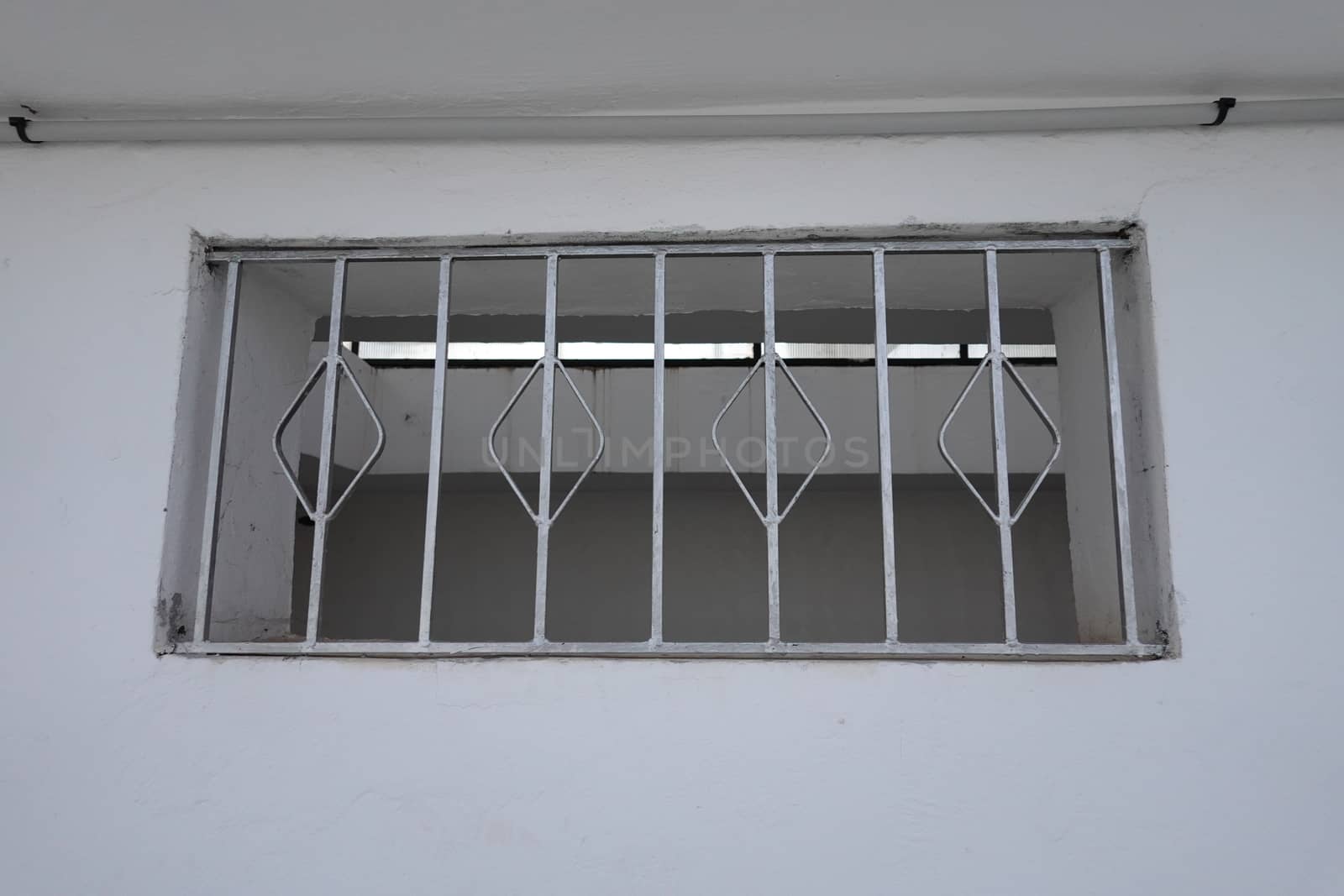 a lonly metal windows frame.. High quality photo by devoxer