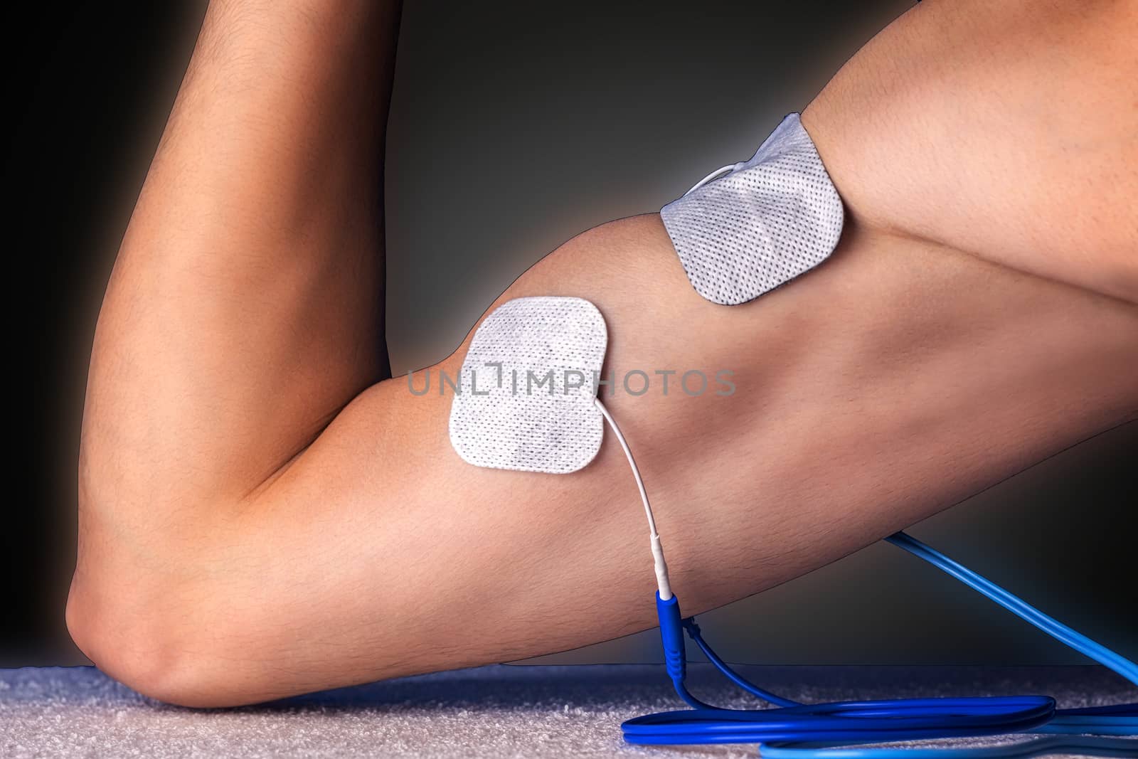 Electro stimulation of biceps for training, recovery or massage.