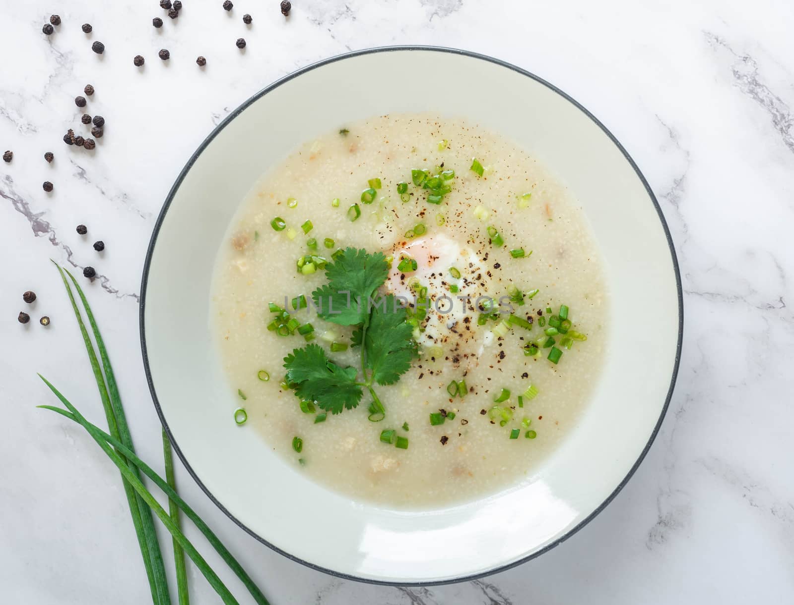 Porridge rice,Ingredients Pepper,Minced pork,Spring onion,Coriander and egg,
Is a healthy food,White background