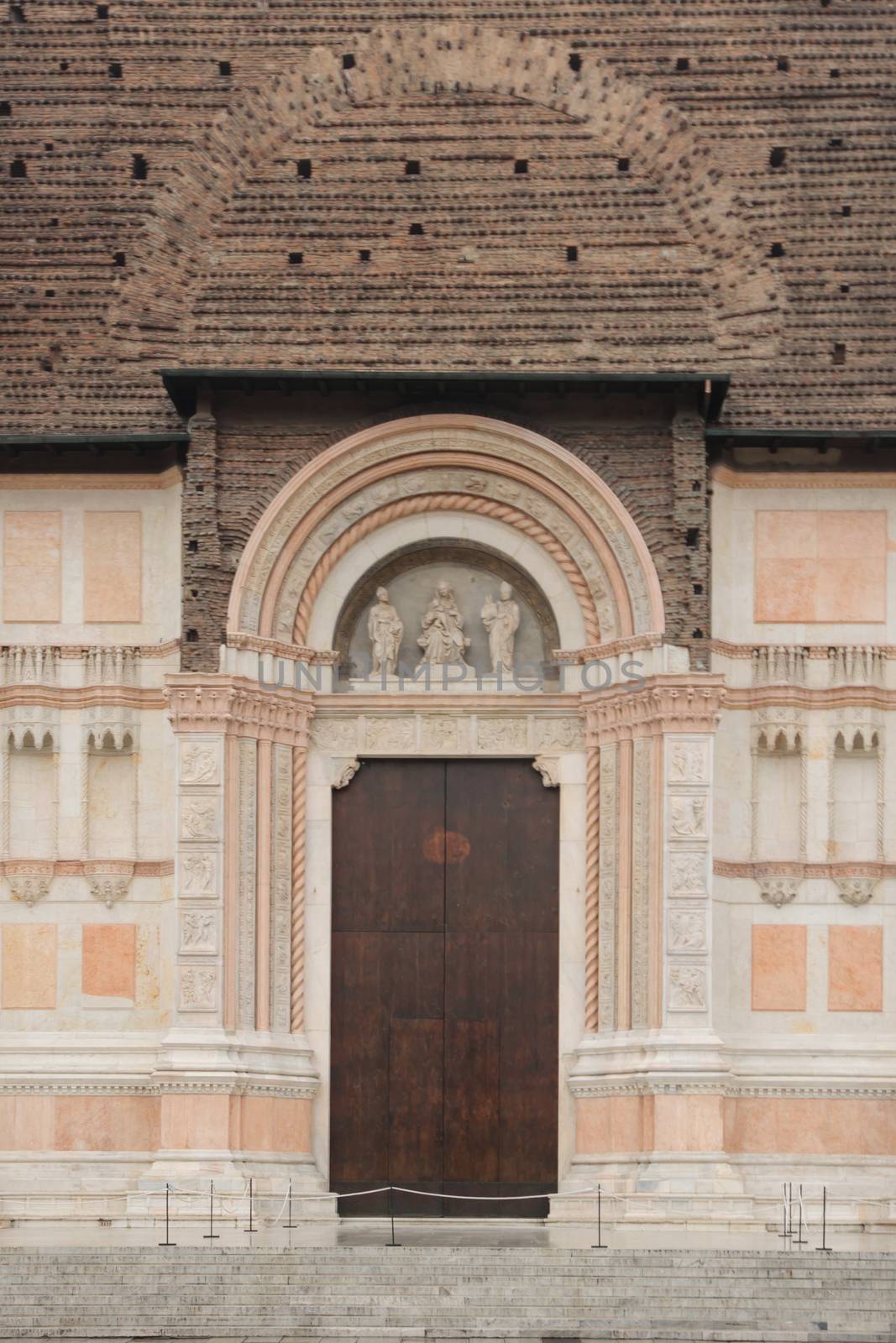 The door of the Basilica of San Petronio in Bologna, Emilia-Romagna, Italy