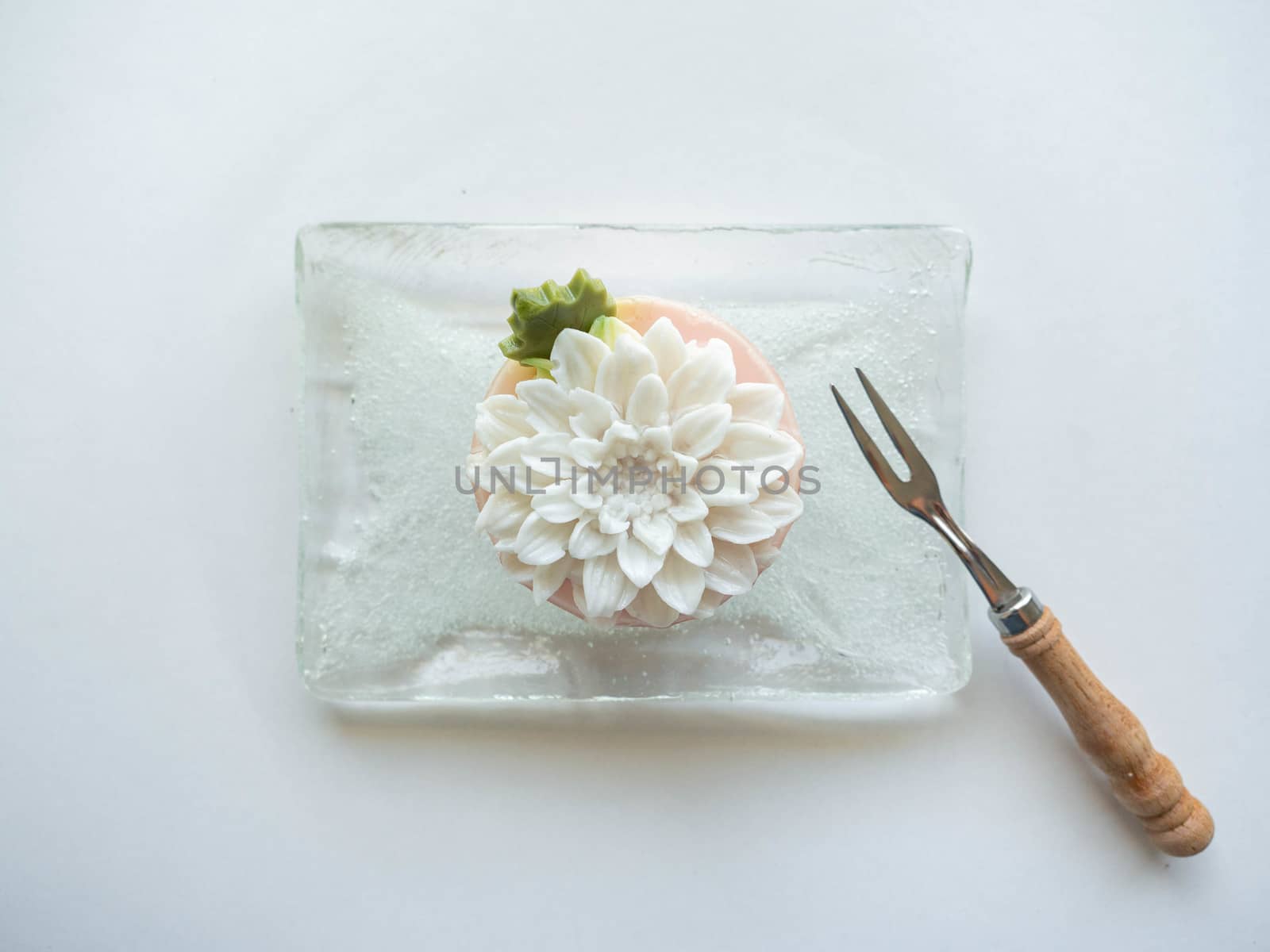 Jelly Thai dessert Flower pattern have Sweet taste on dish glass,Made from coconut milk,White Background
