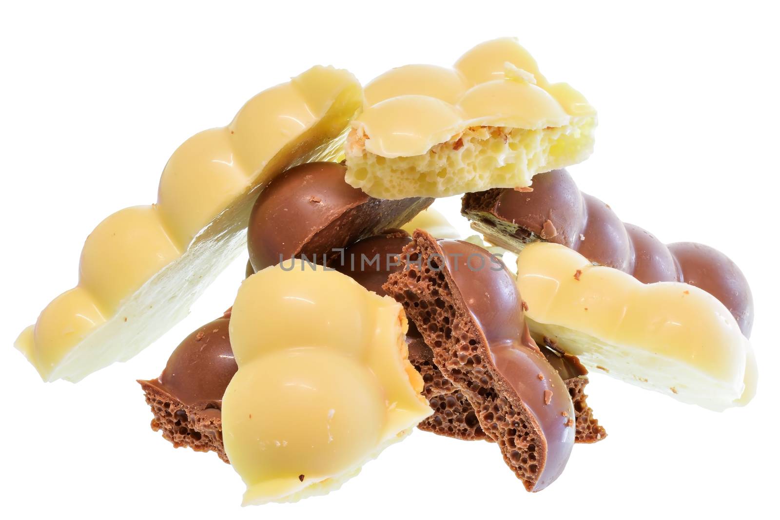 Broken heap porous chocolate Isolated on a white background.