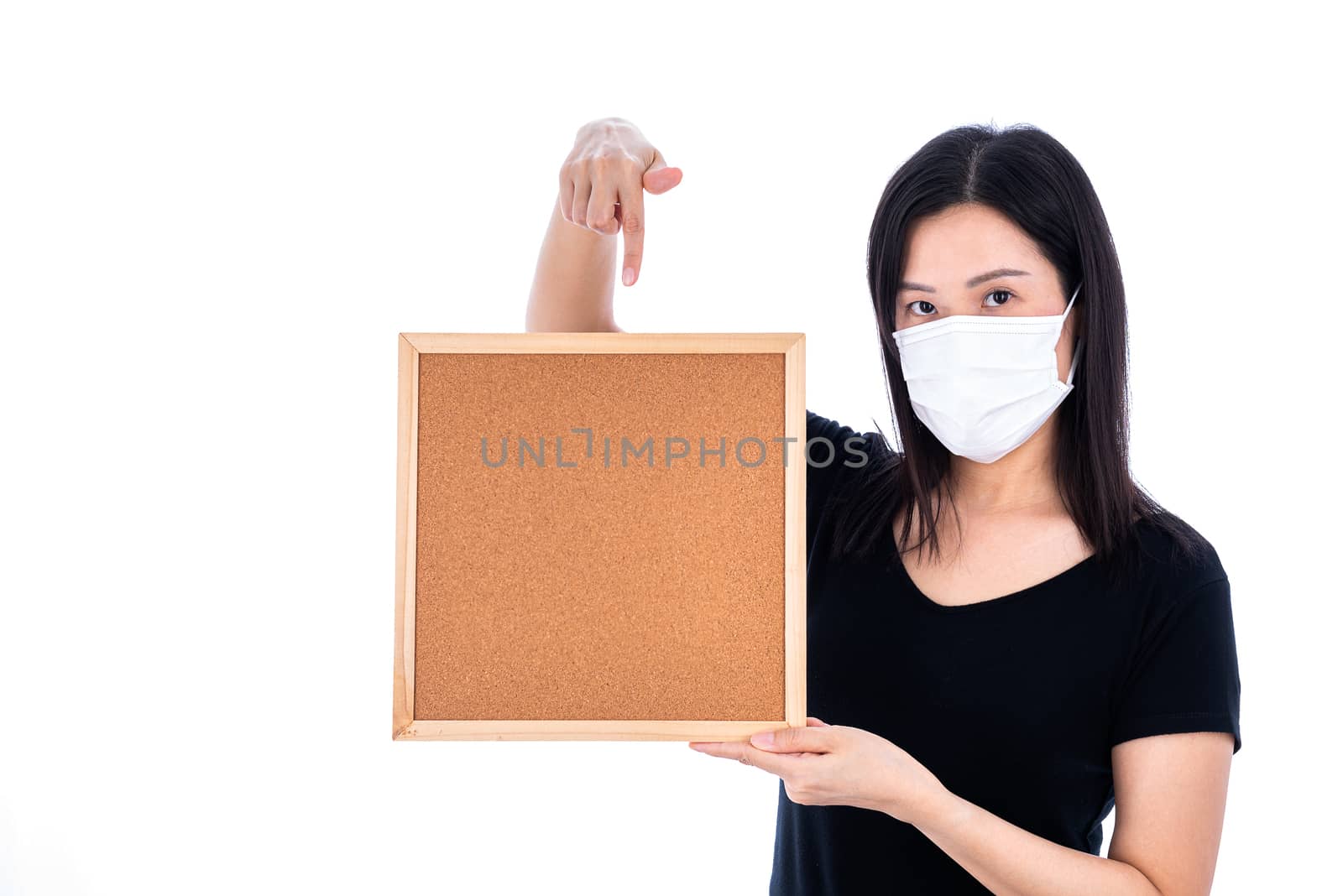 An Asian woman holding an empty board for writing COVID-19 prevention isolated on white background.