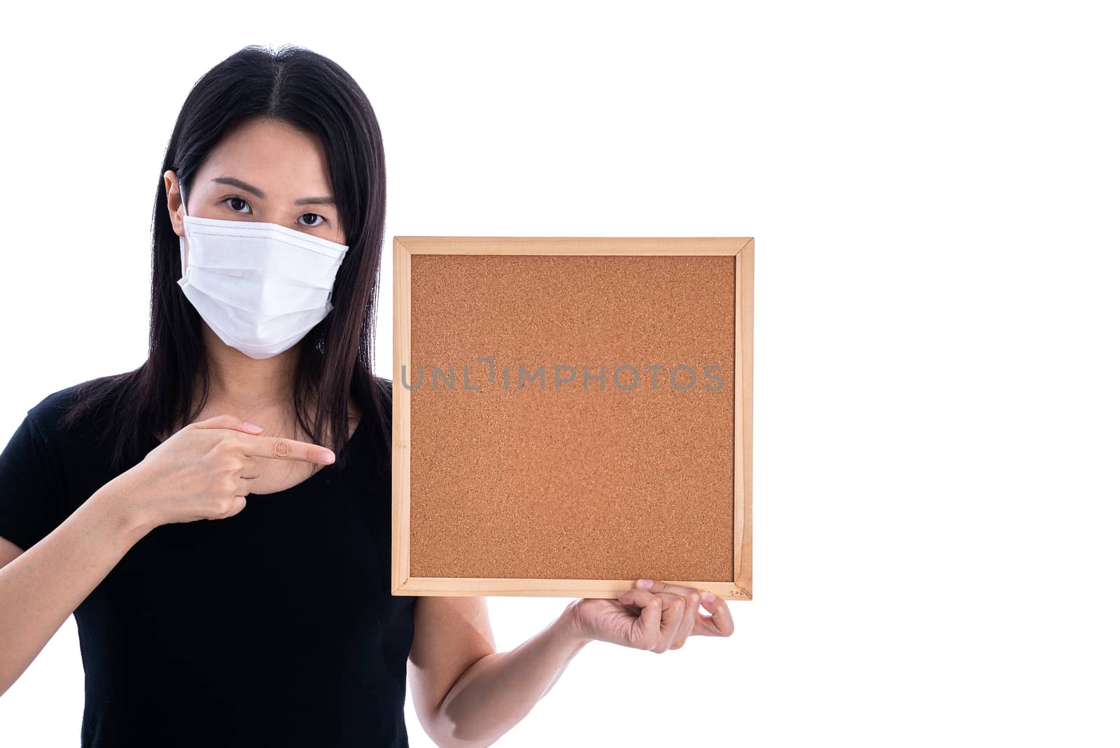 An Asian woman holding an empty board for writing COVID-19 prevention isolated on white background.