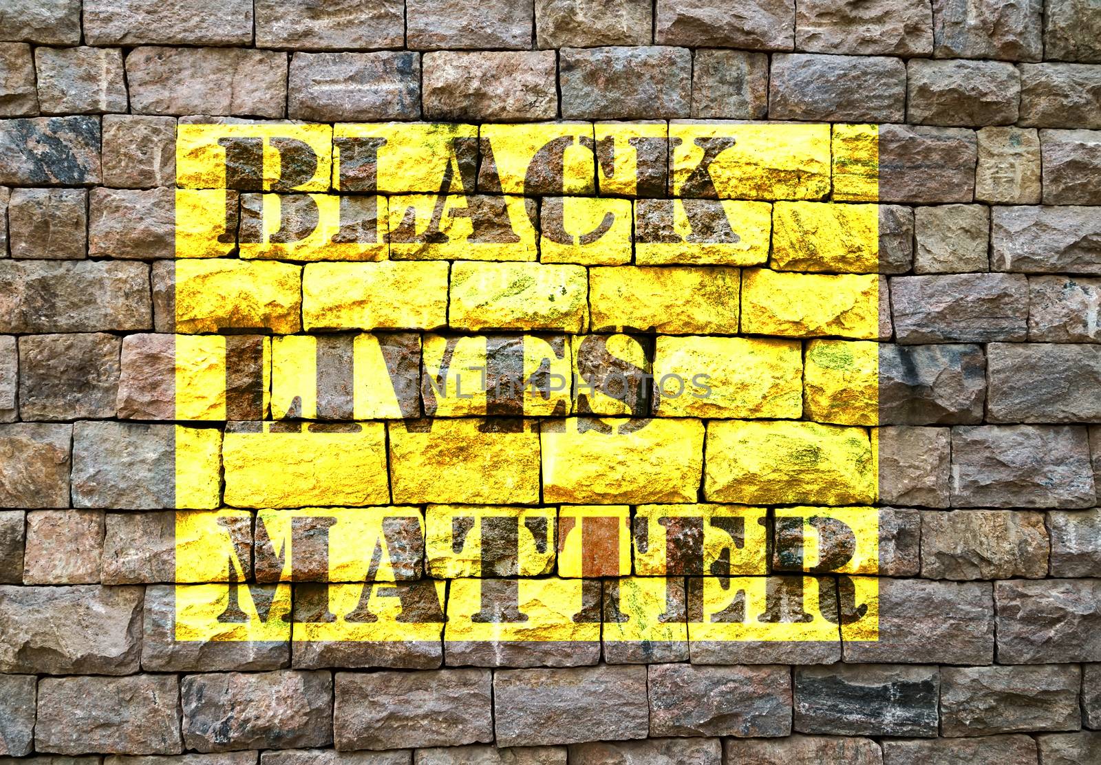 Black Lives Matter slogan liberation banner designs yellow stencil Old brick wall background texture stone
