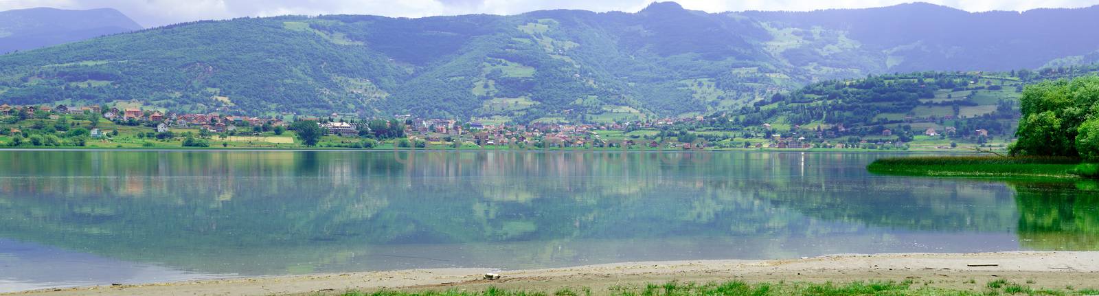 Panoramic view of Plav Lake and the Plav town in southern Montenegro