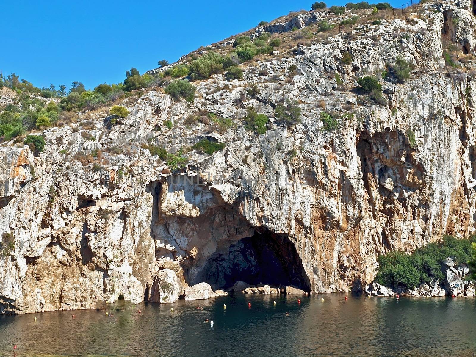 Natural swimming area in Athens in Greece with cliffs