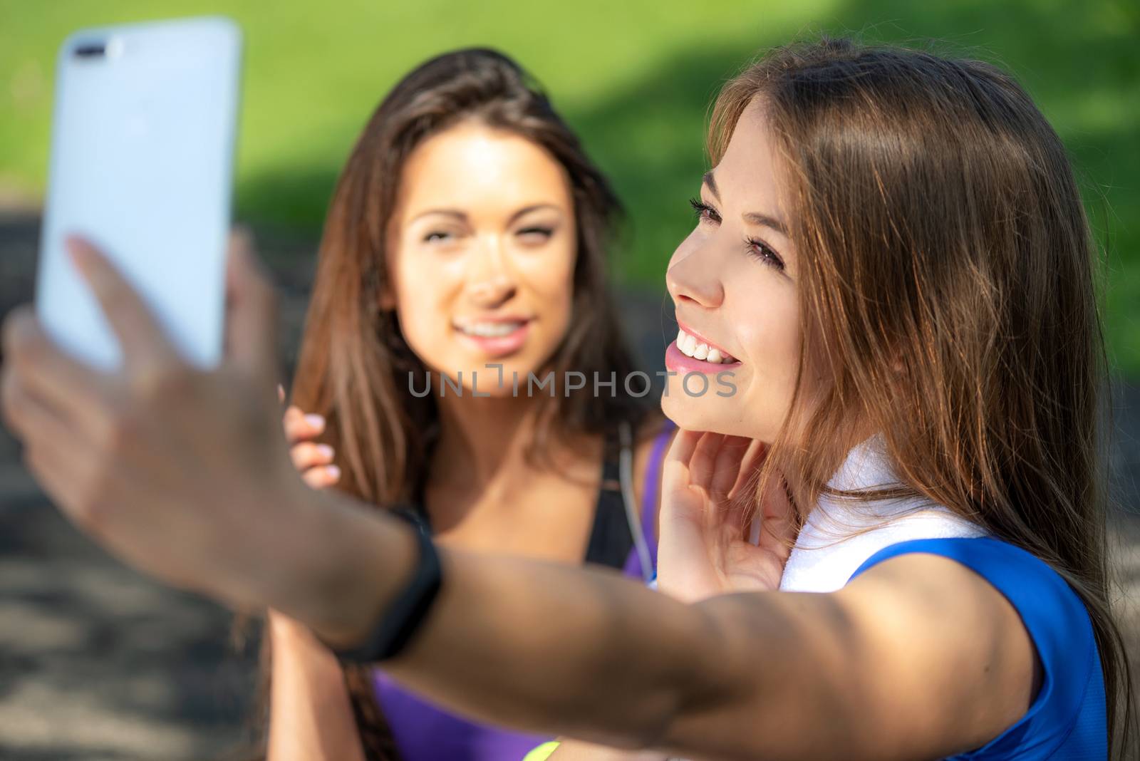 Girls taking selfie by wdnet_studio