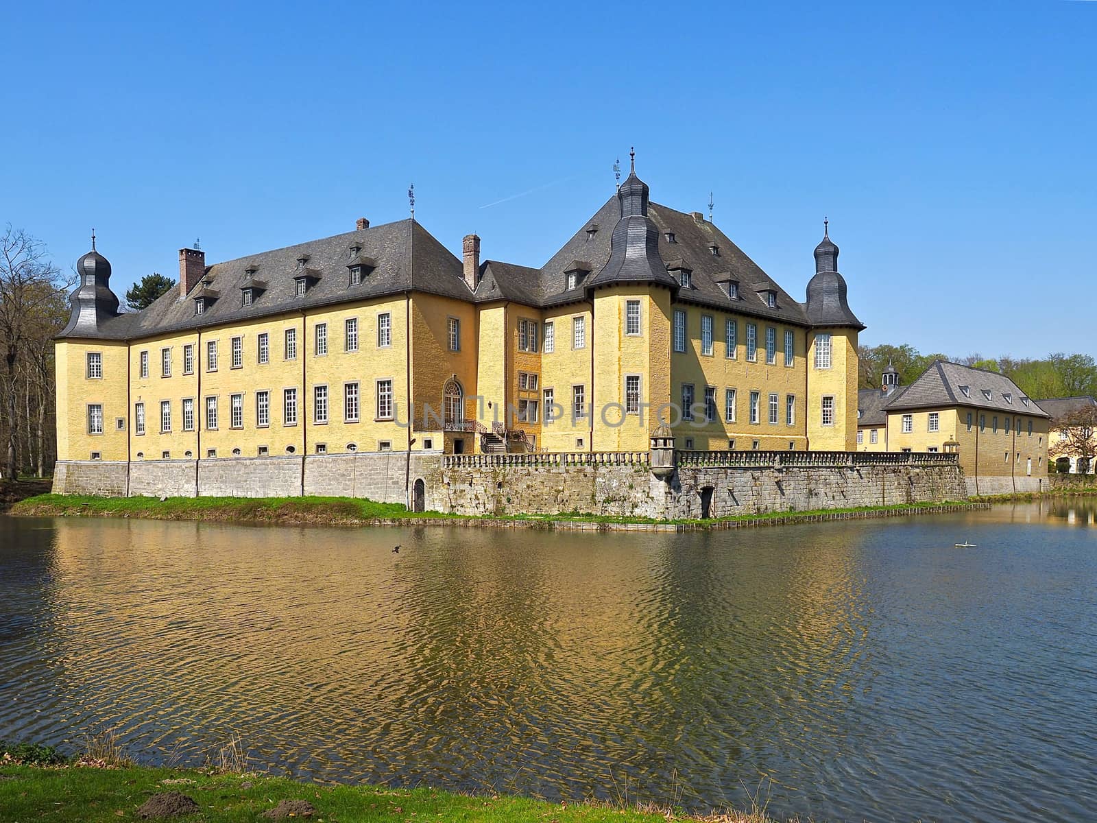 German yellow water castle Schloss Dyck in spring