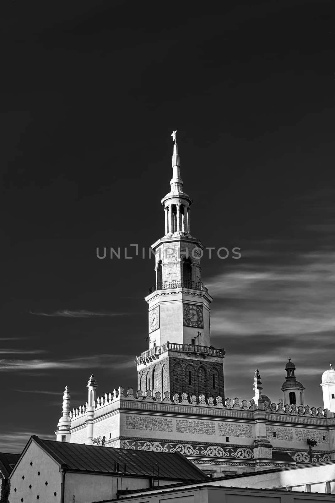 the tower of the Renaissance town hall on the market square in Poznan, black and white