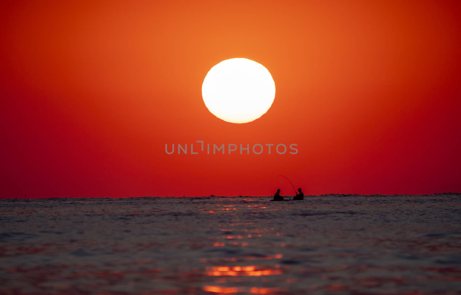 big sun down over sea sunrise, red sky