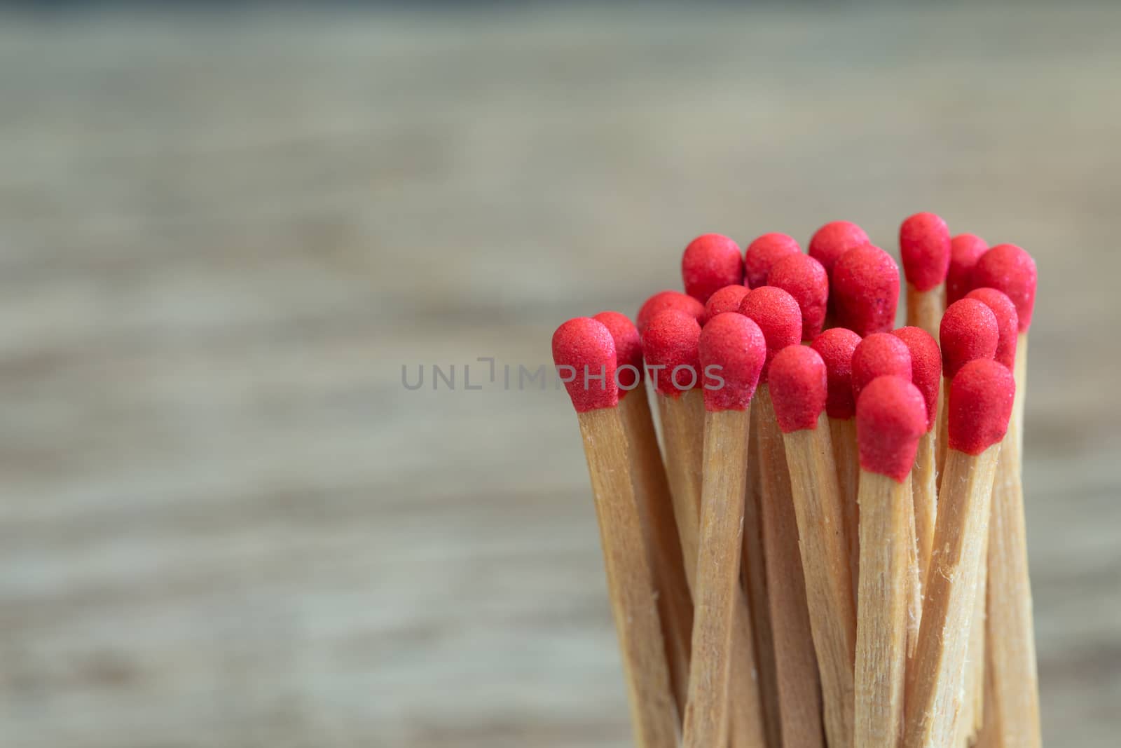 Group of matches on a blurred background by Natstocker
