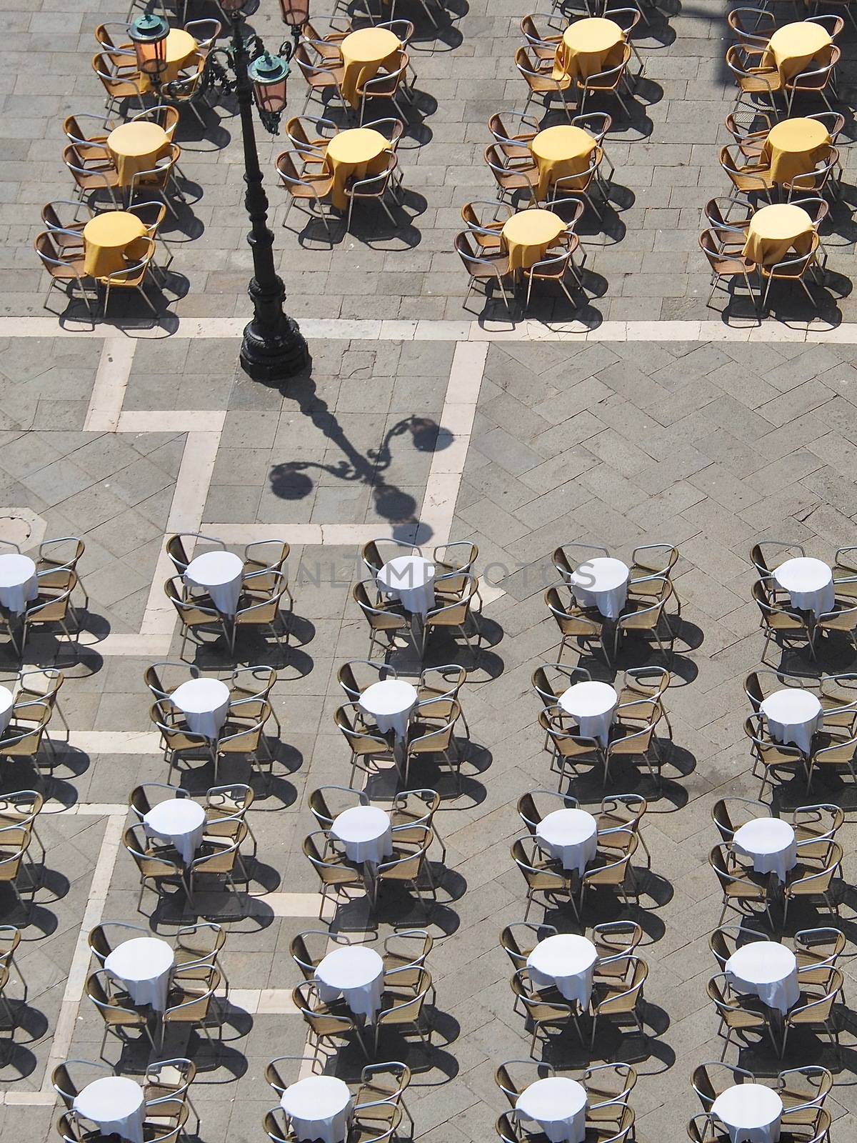 Aerial view of empty tables and chairs in Venice by Stimmungsbilder