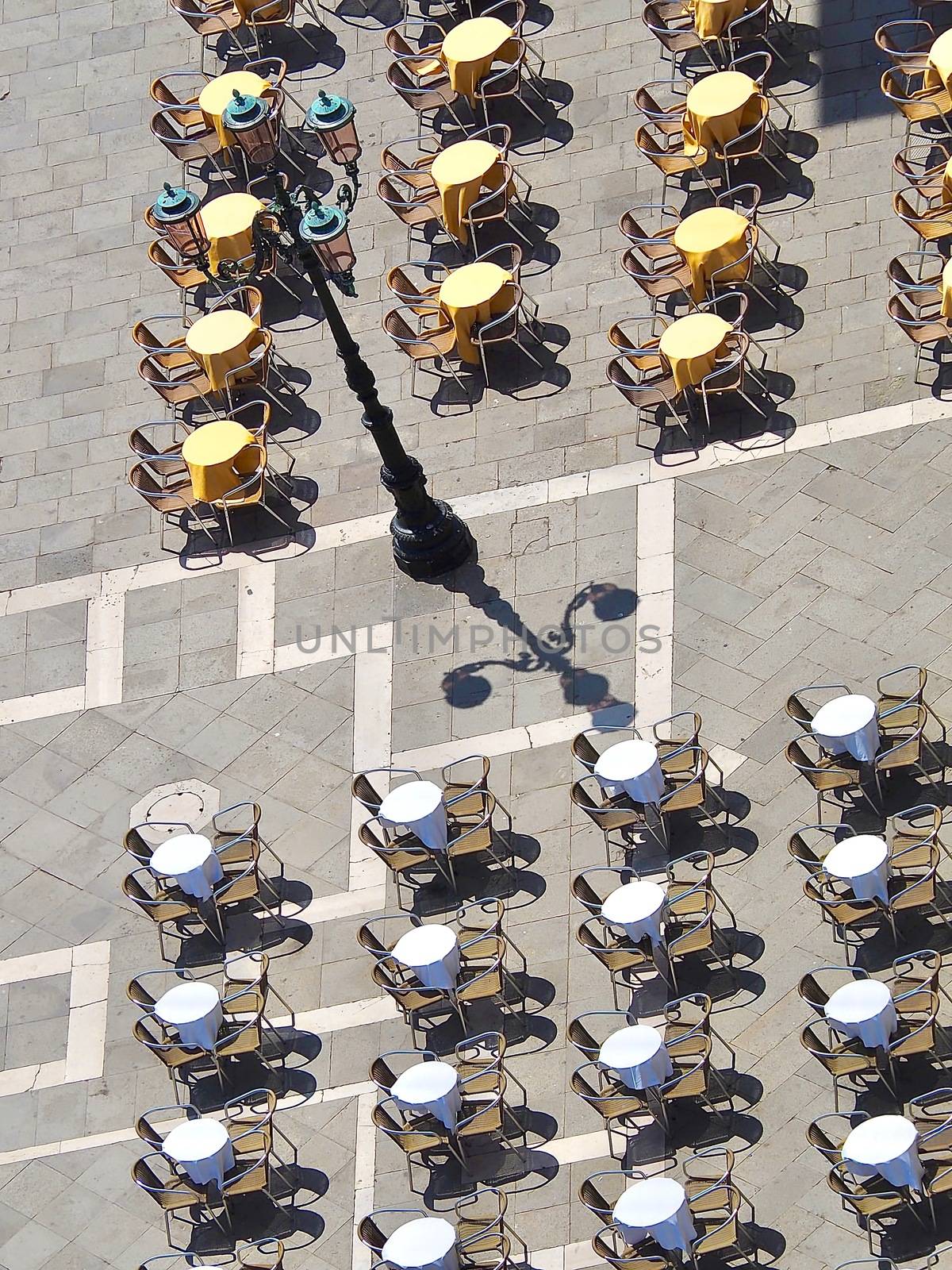 Aerial view of empty tables and chairs in Venice by Stimmungsbilder