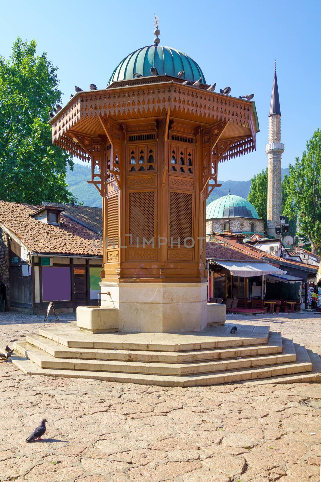 The Sebilj fountain, local businesses, in Sarajevo, Bosnia and Herzegovina