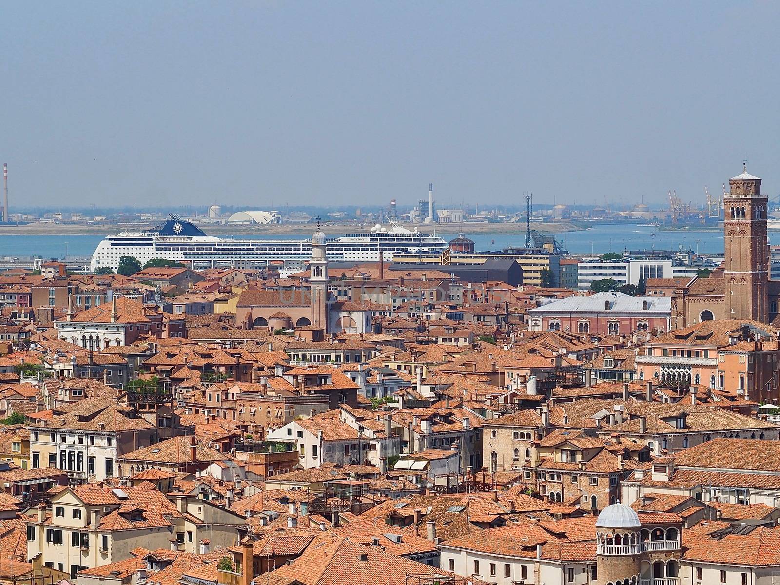 Looking over the red roofs of Venice from the Campanile in direction tower Santo Stefano