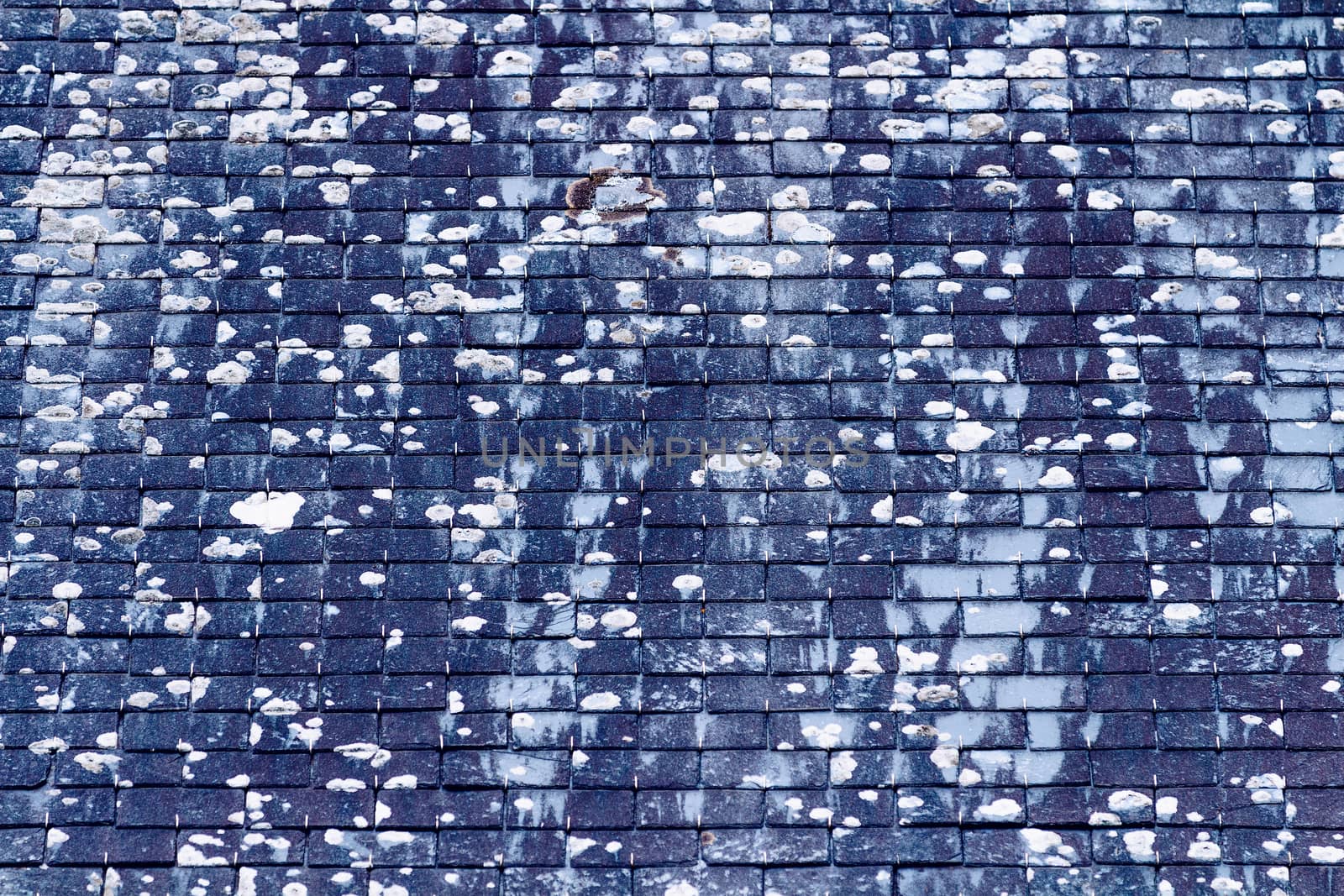 Background of old stone roof tiles