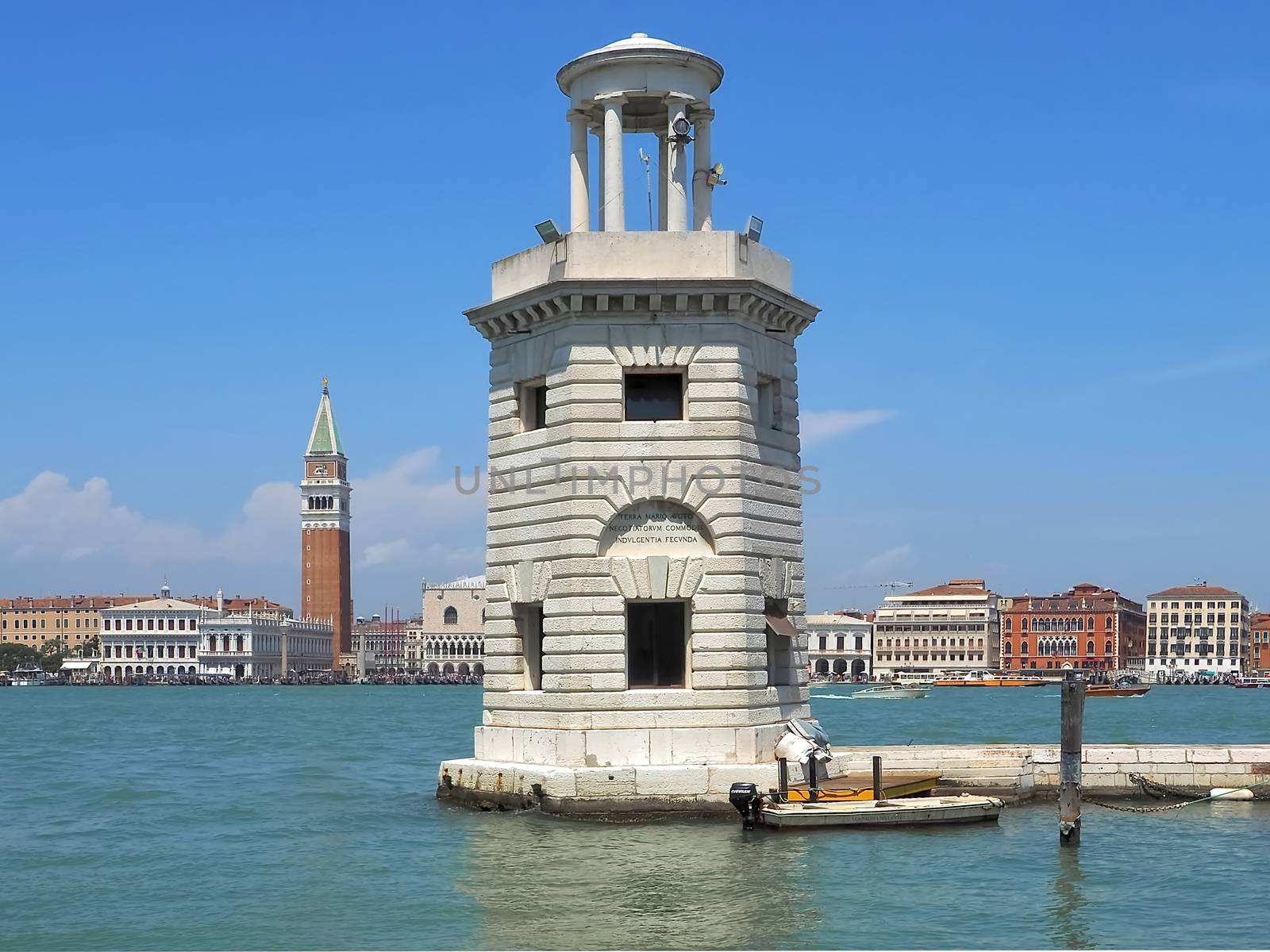 Lighthouse in Venice in Italy with the skyline
