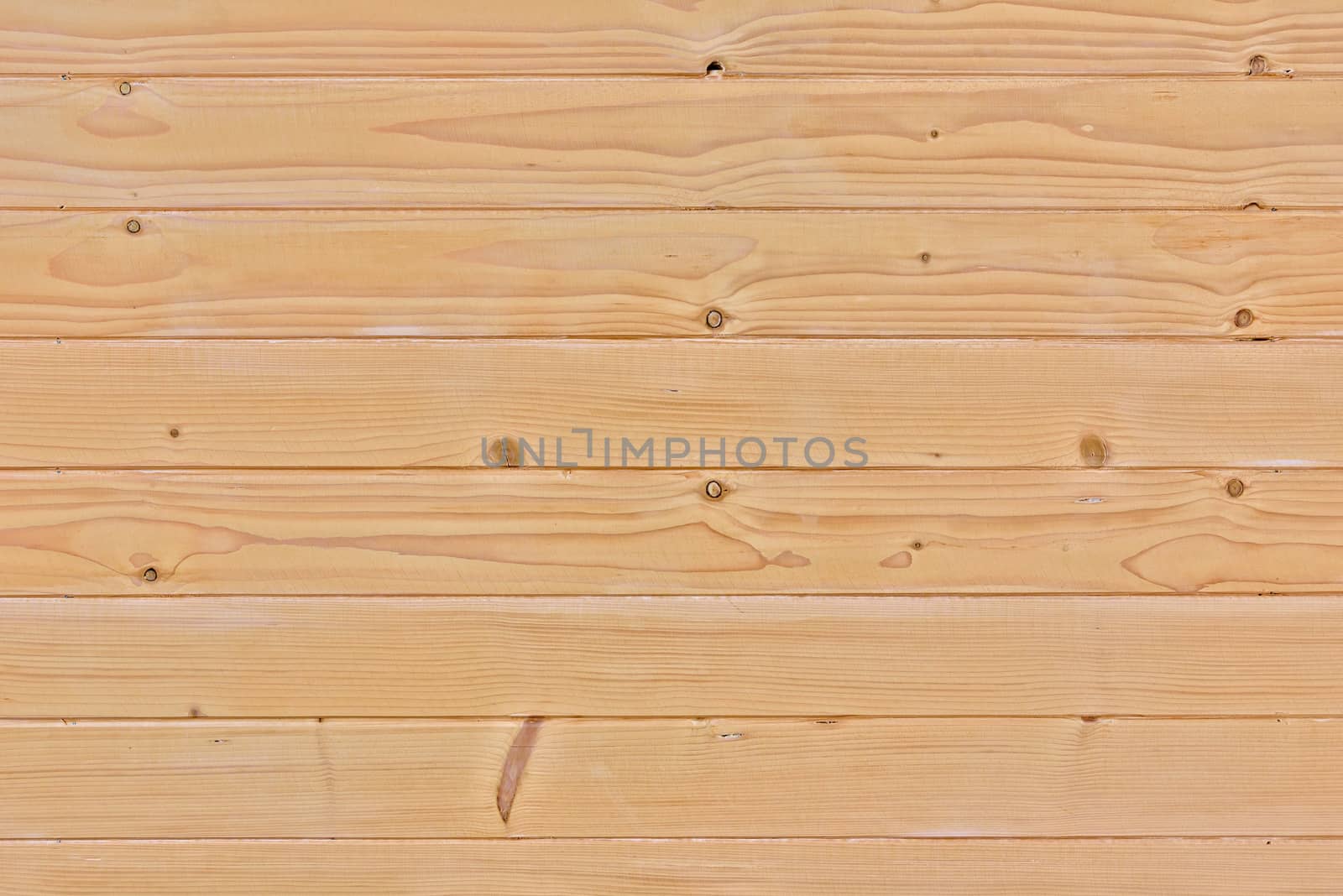 Background or texture made of raw wooden slats