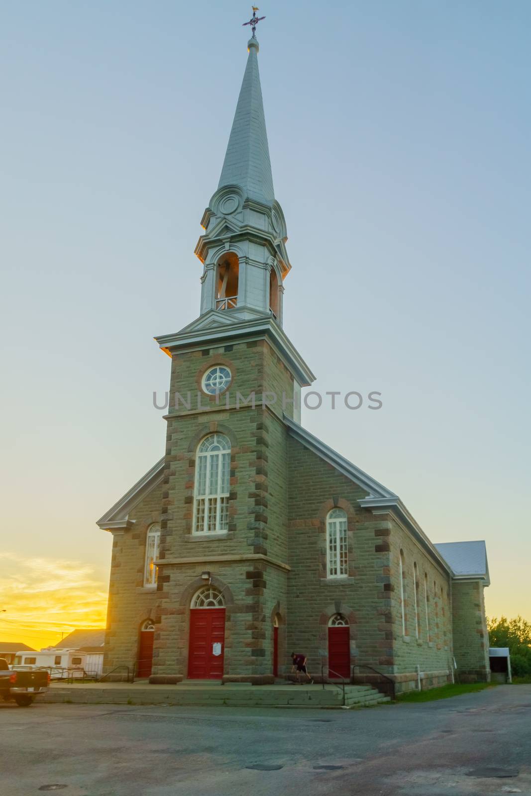 Sunset view of the Saint-Edouard Catholic church, in Les Mechins, Gaspe Peninsula, Quebec, Canada