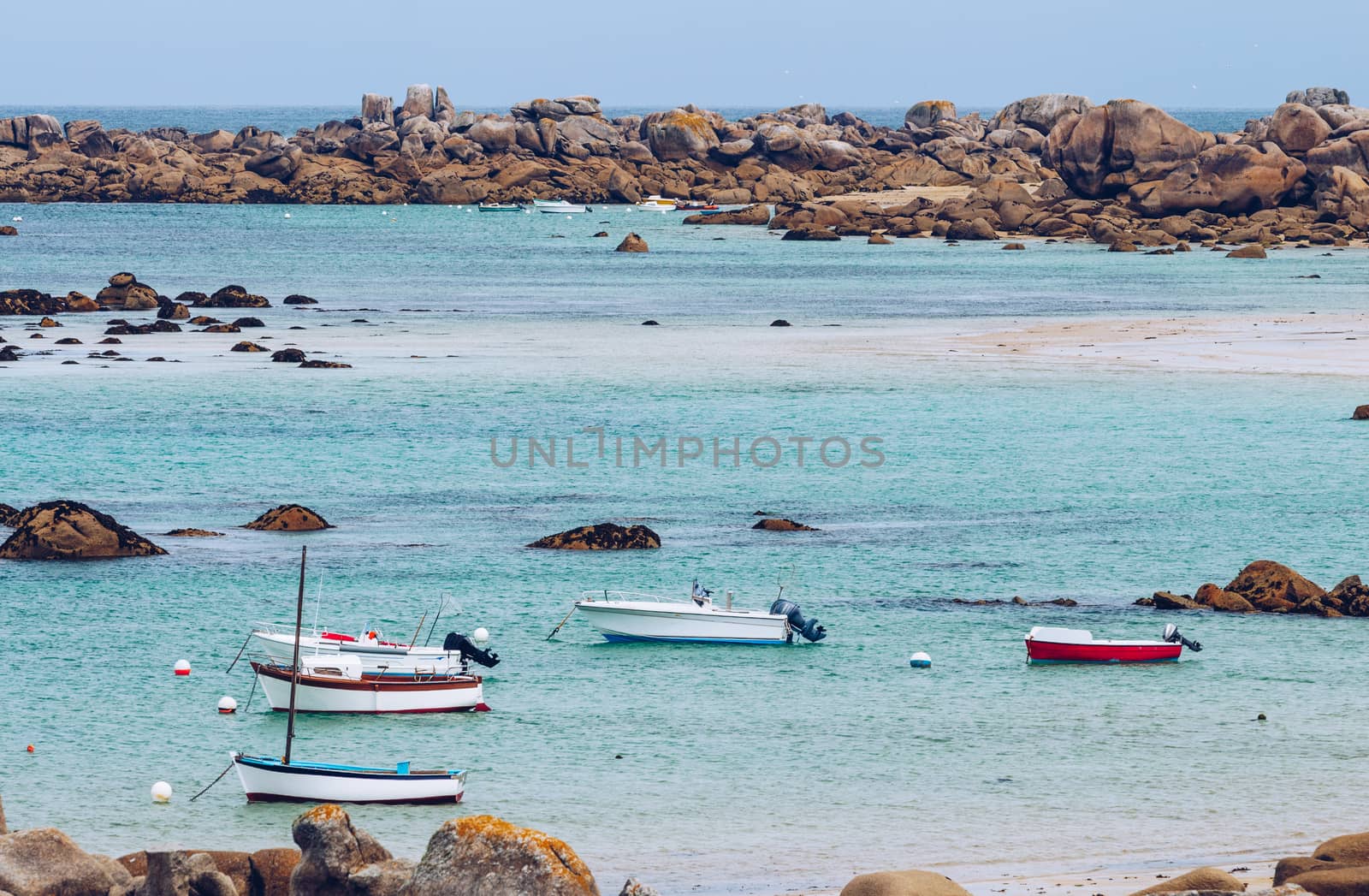 Boats in the port on the Pink Granite Coast (cote de granite rose in french). Brittany (Bretagne), France