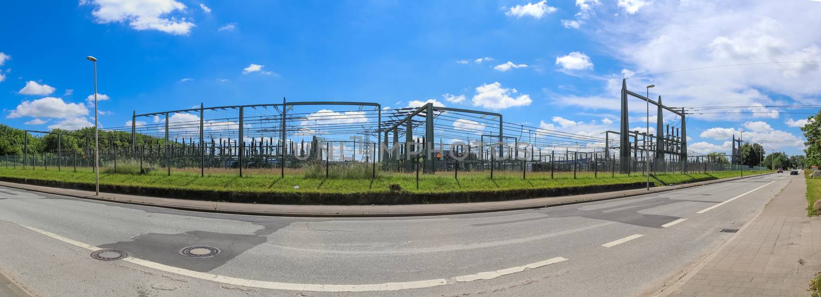 Electrical Transformer. Distribution of electric energy at a big substation with lots power lines