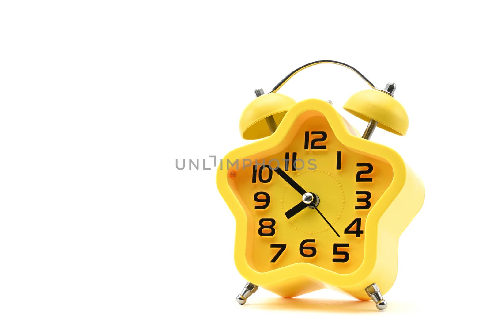 Yellow watch with five petals. Alarm clock on a white background