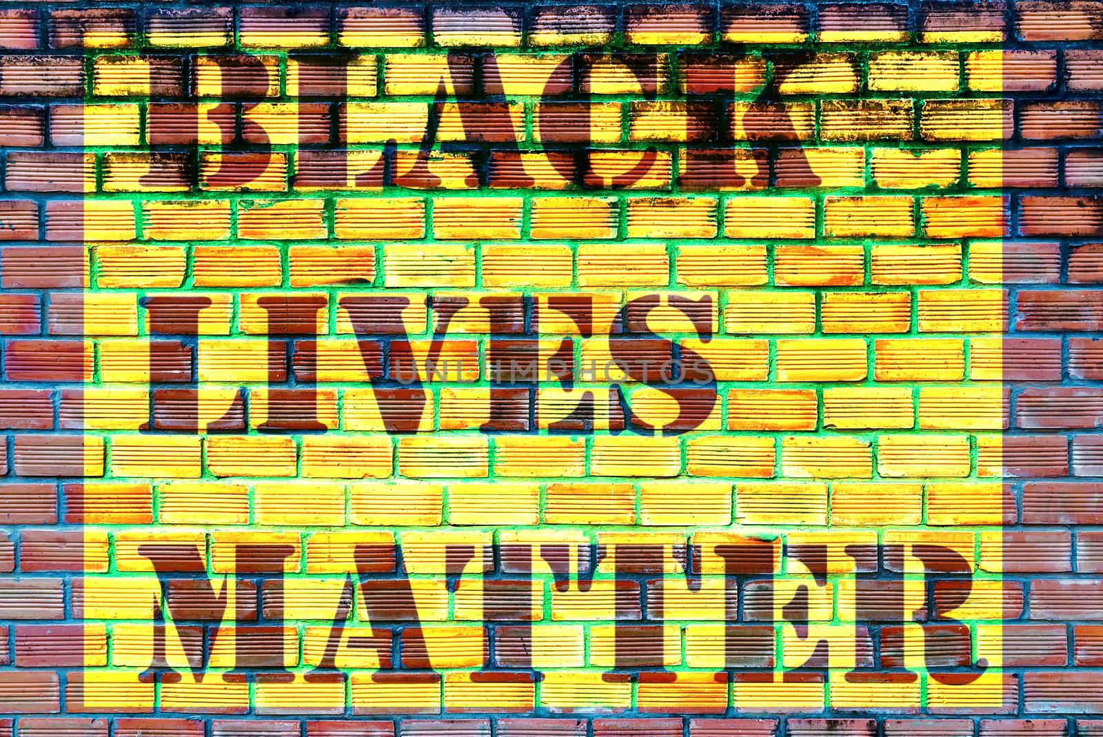 Black Lives Matter slogan text liberation banner designs stencil yellow stencil brick wall background