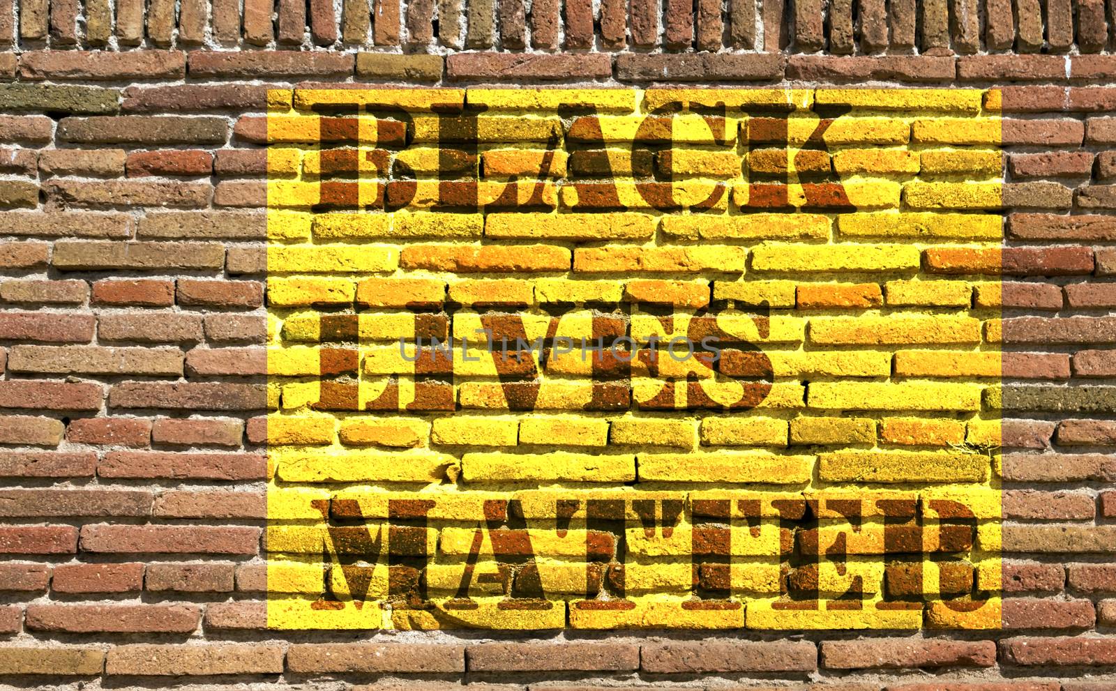 Black Lives Matter slogan liberation banner designs yellow stencil backdrop old brick wall background texture