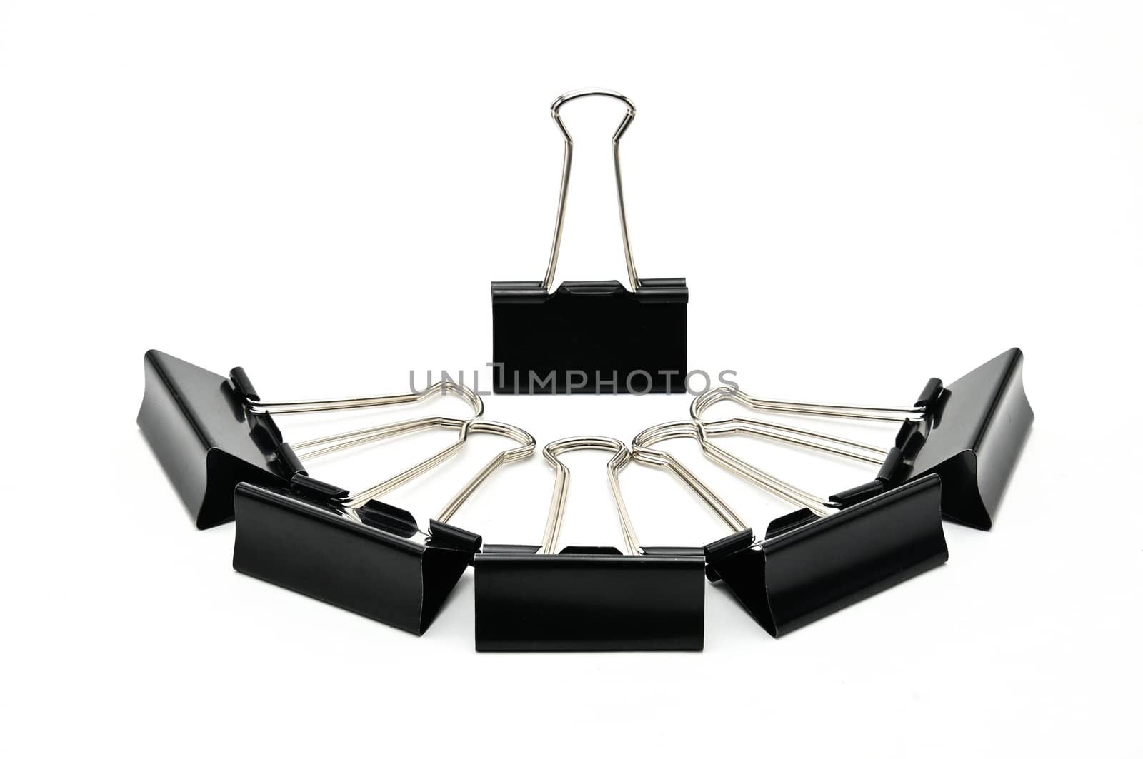 Binder clips paper clamp on an isolated background by moviephoto