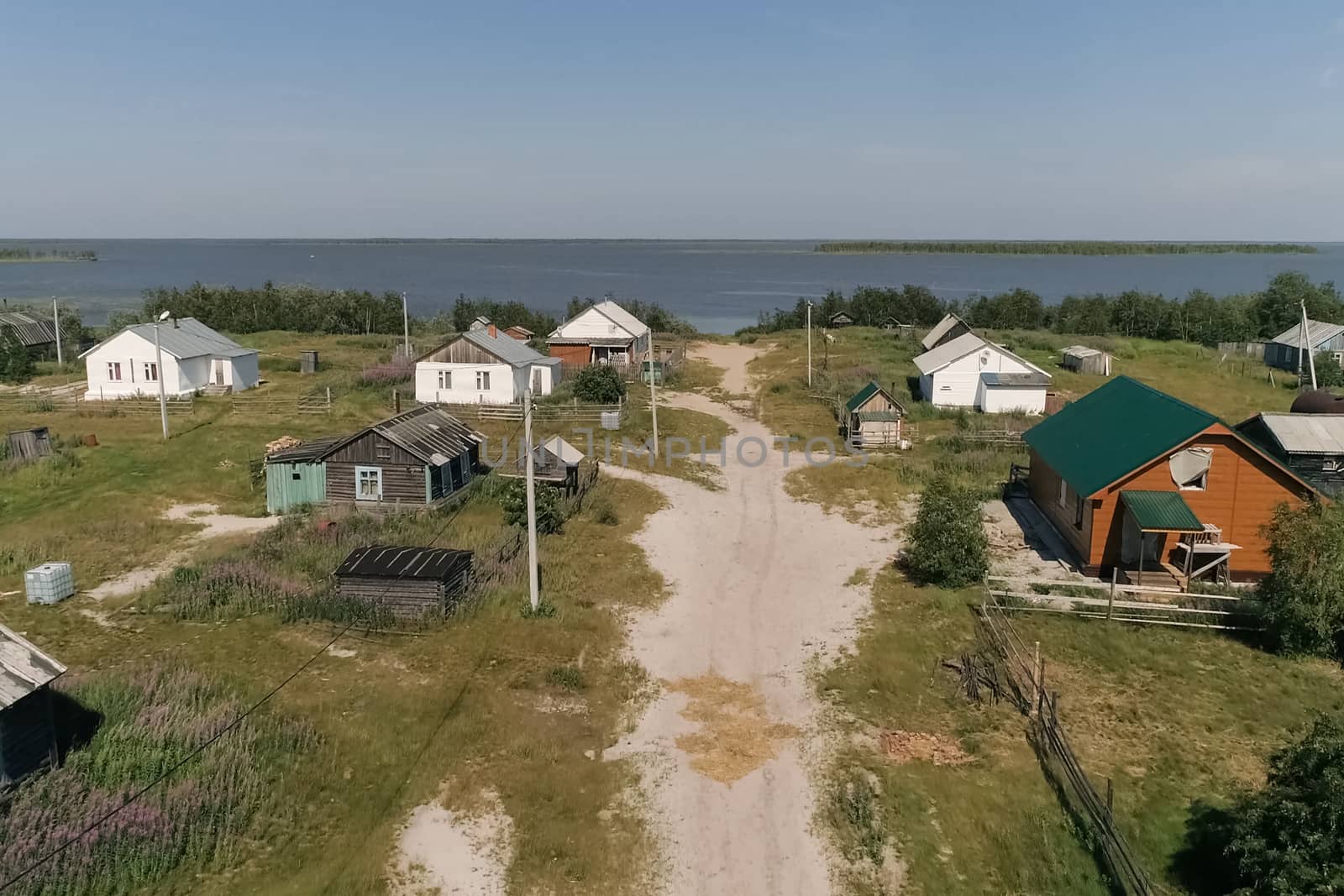 village near a lake in the taiga. The village of Numto in Ugra. by DePo