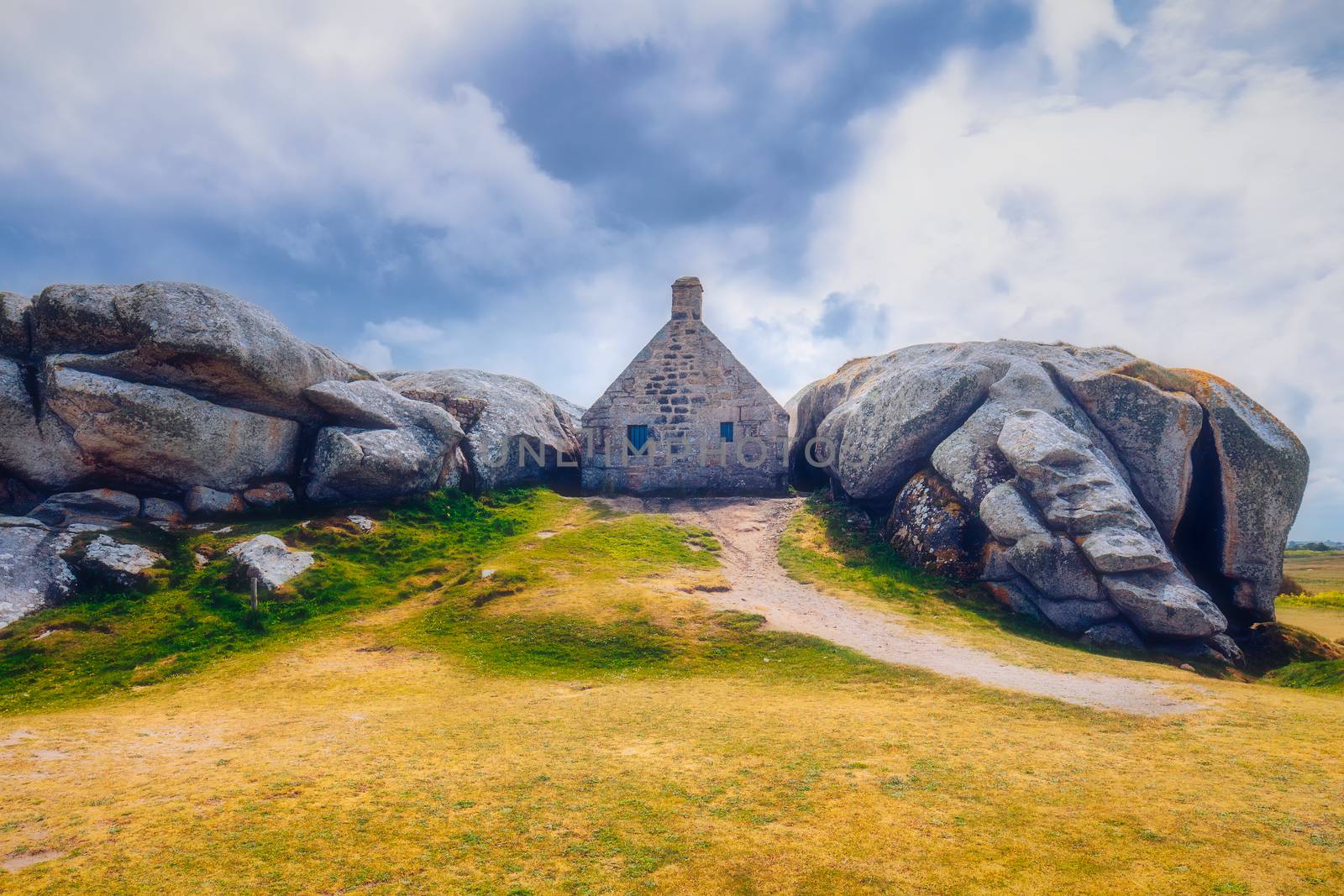 House between the rocks in Meneham village, Kerlouan, Finistere, Brittany (Bretagne), France