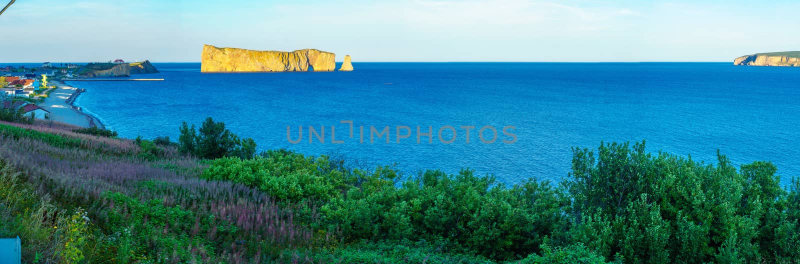 Panoramic view of the Bonaventure Island, Perce rock, and Perce village, at the tip of Gaspe Peninsula, Quebec, Canada