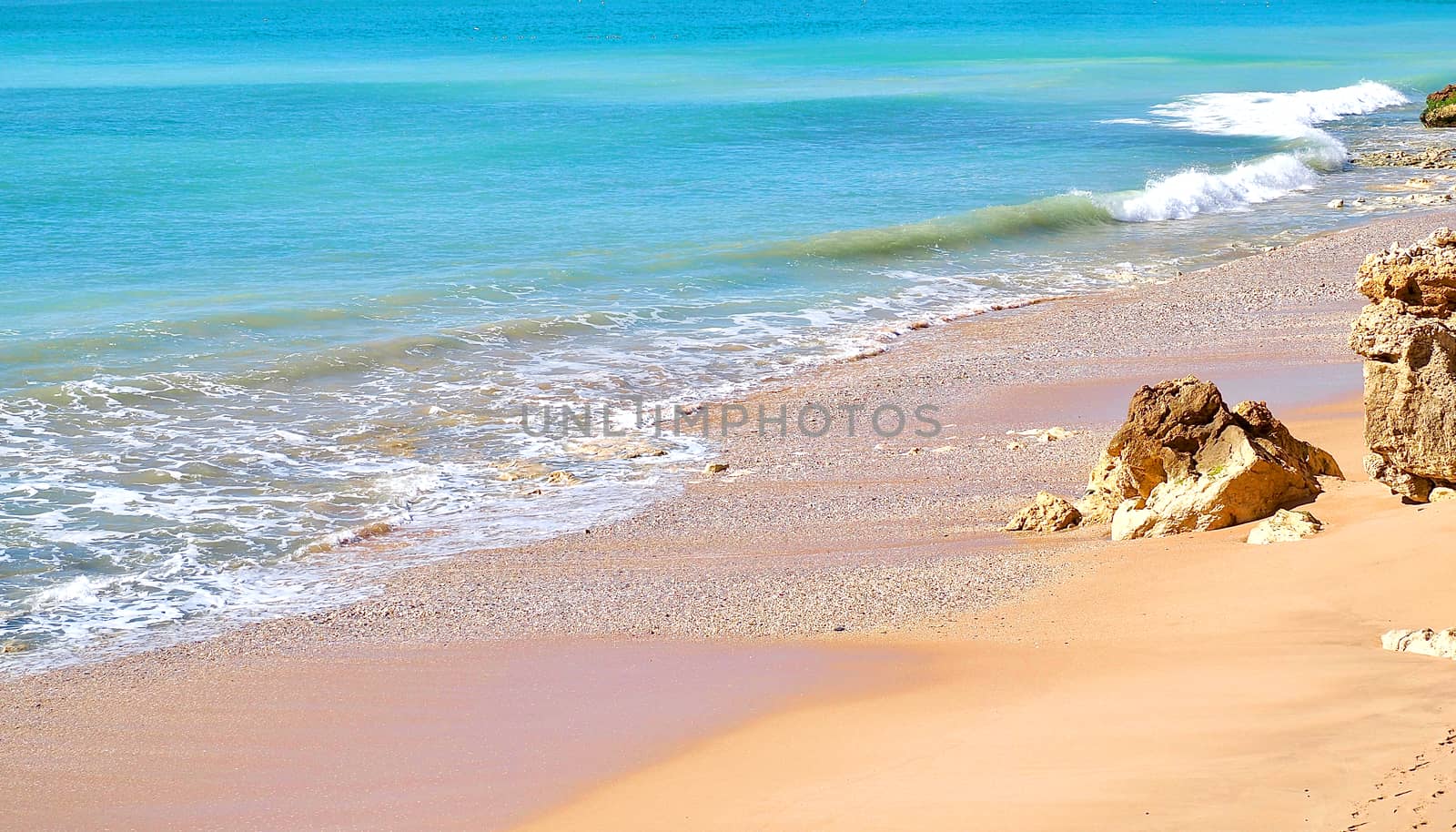 Romantic coast of Albufeira in Portugal with blue Atlantic ocean by Stimmungsbilder