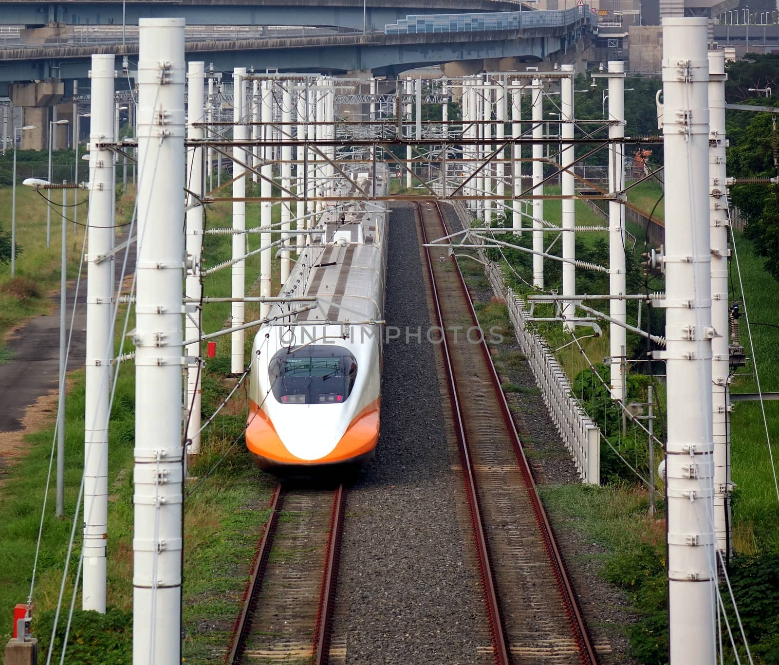 KAOHSIUNG, TAIWAN -- OCTOBER 17, 2015: A modern bullet train of the Taiwan High Speed Railway Corporation sits on its tracks.
