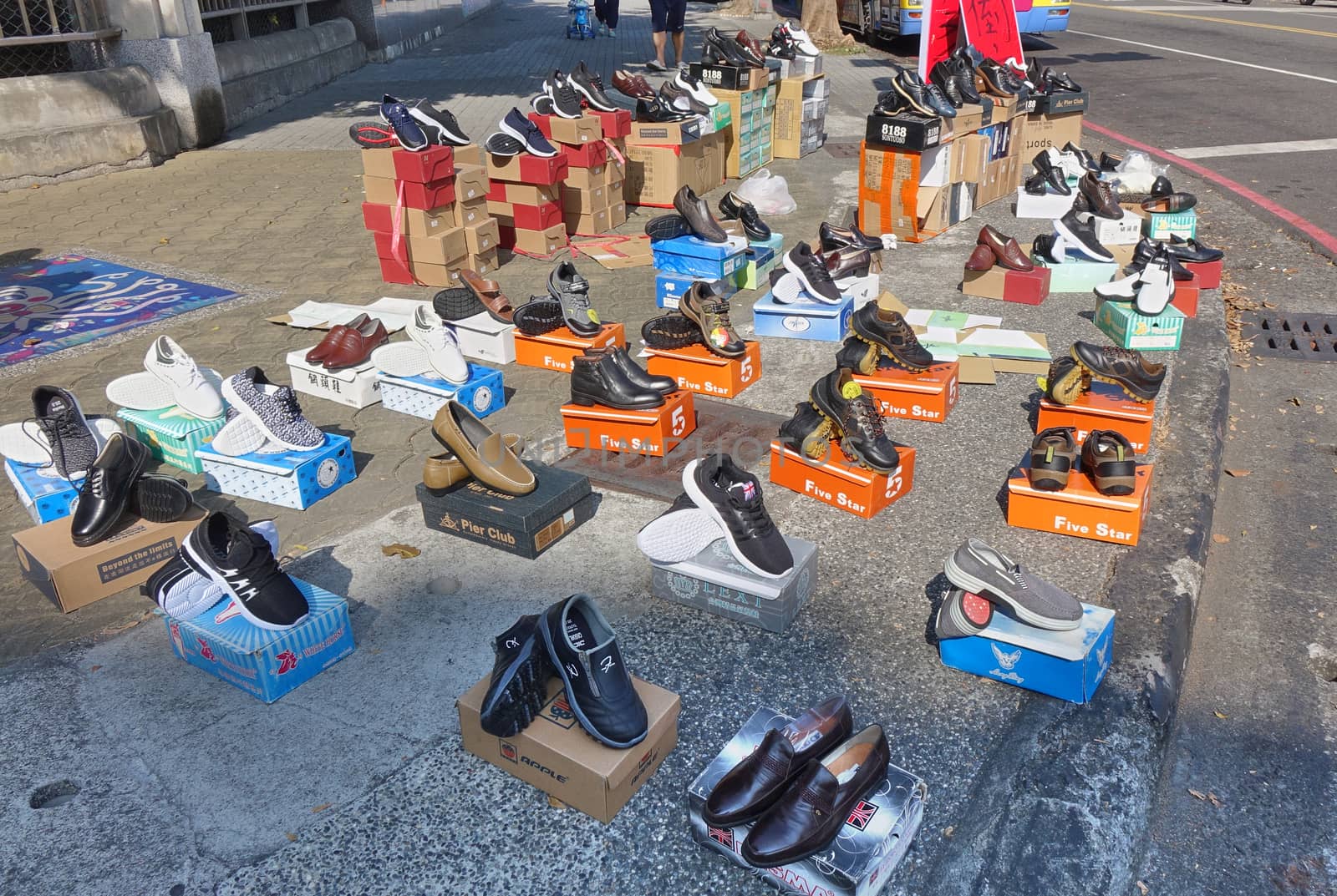Street Vendor Sells New Shoes by shiyali