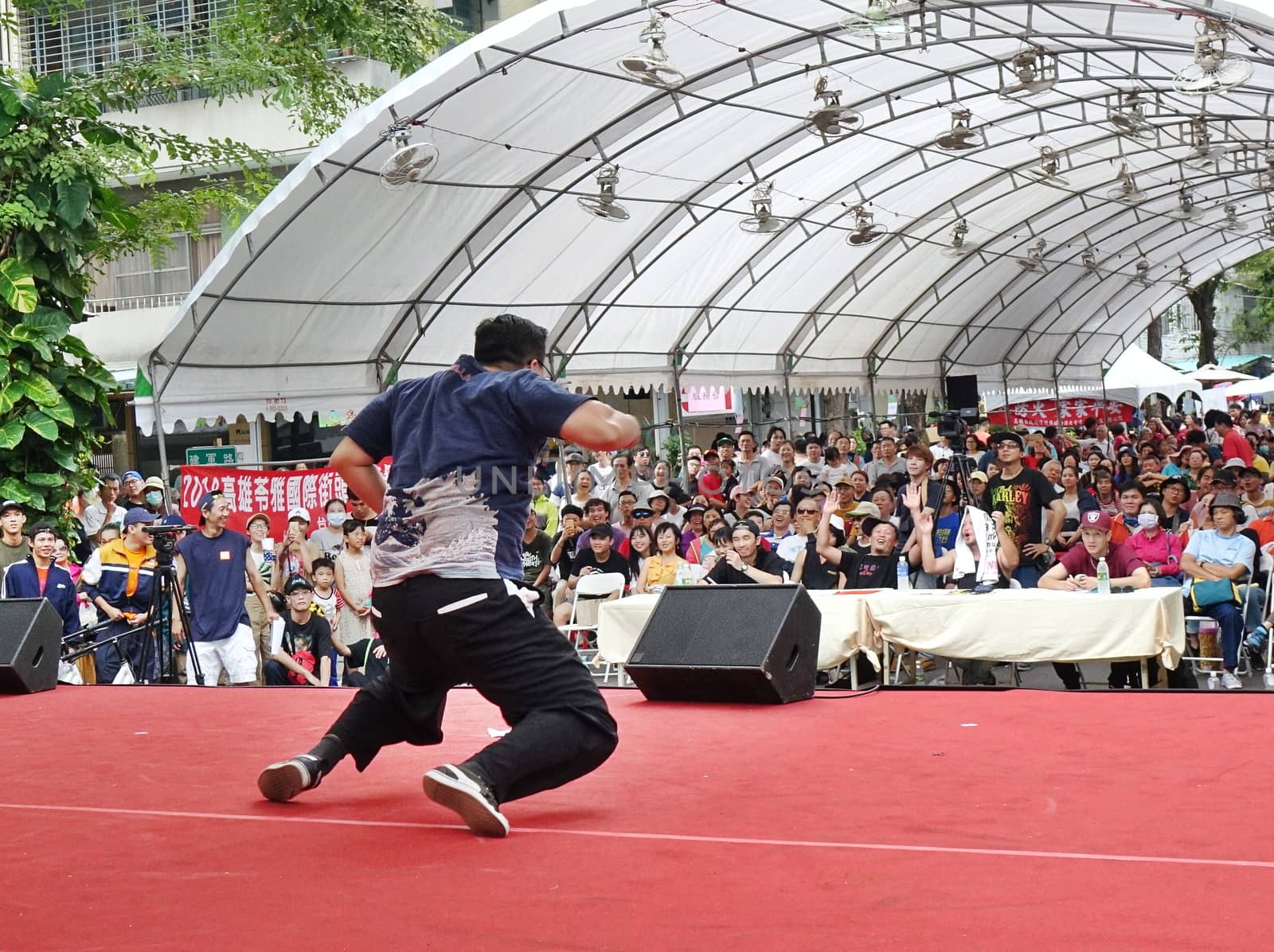 KAOHSIUNG, TAIWAN -- JULY 14, 2017: A male dancer participates in the hip-hop competition at the 2018 Street Art Festival.