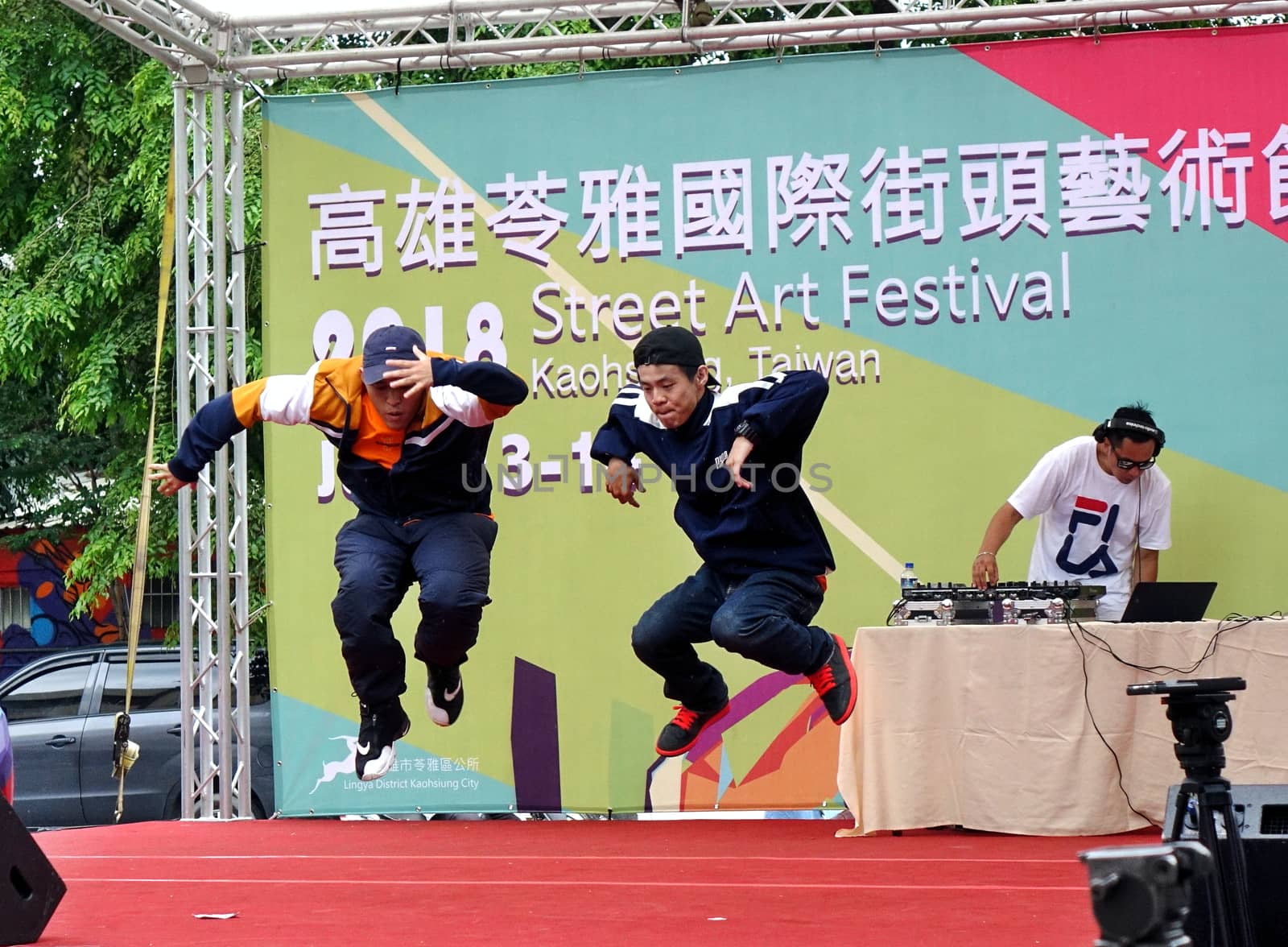KAOHSIUNG, TAIWAN -- JULY 14, 2017: Two male dancers participate in the hip-hop competition at the 2018 Street Art Festival.