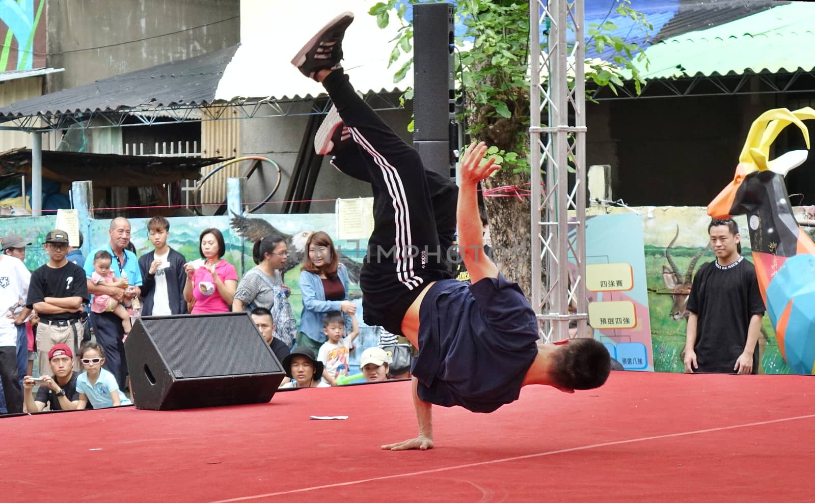 KAOHSIUNG, TAIWAN -- JULY 14, 2018: A male dancer participates in the hip-hop competition at the 2018 Street Art Festival.