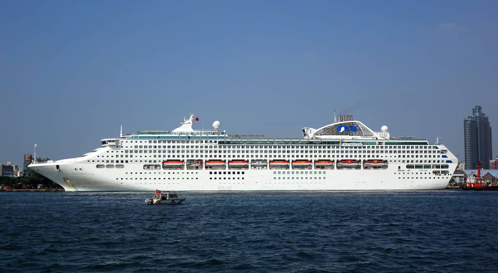 KAOHSIUNG, TAIWAN -- OCTOBER 11, 2014:  The cruise ship Sun Princess with more than 1000 guest cabins docks at Kaohsiung Harbor.
