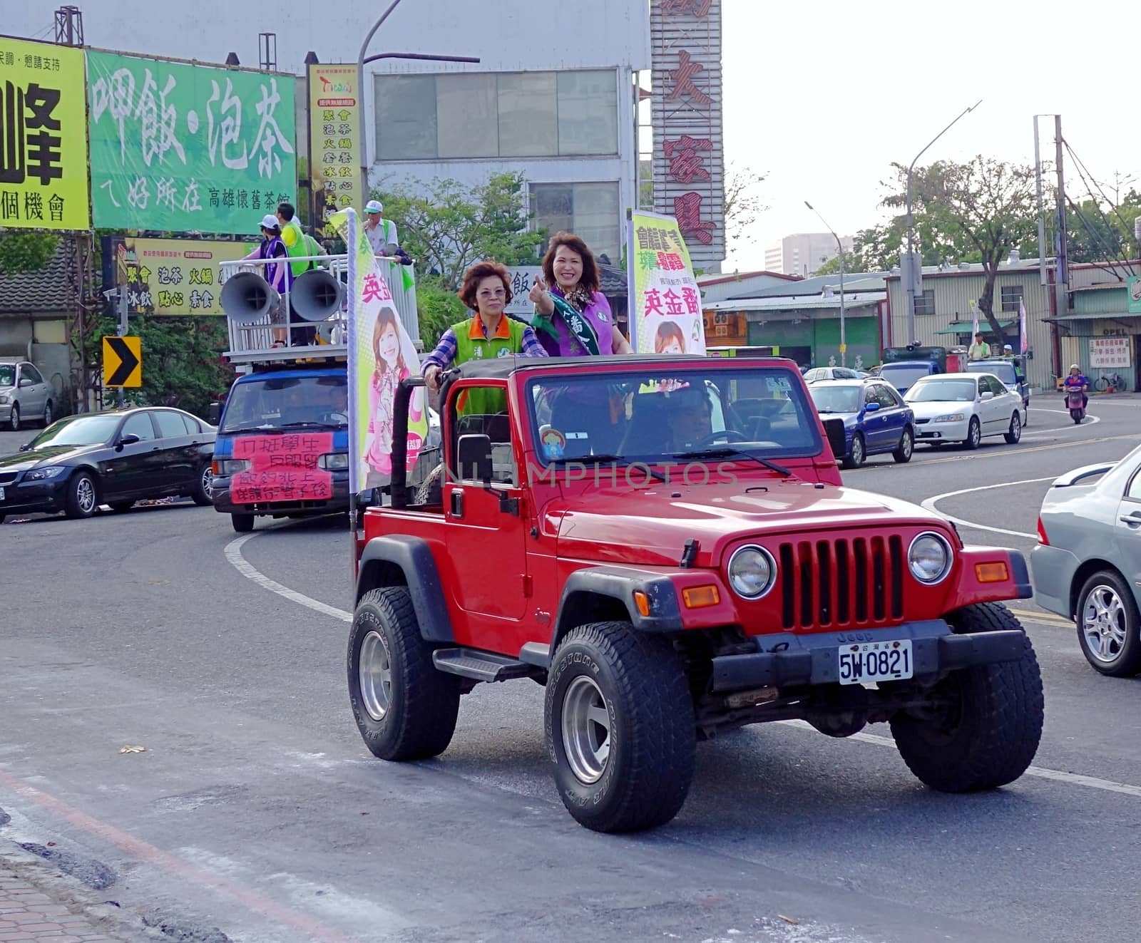 KAOHSIUNG, TAIWAN -- MARCH 29, 2014: City council candidate Pan Jing Ying campaigns in the run up for the 2014 local elections.