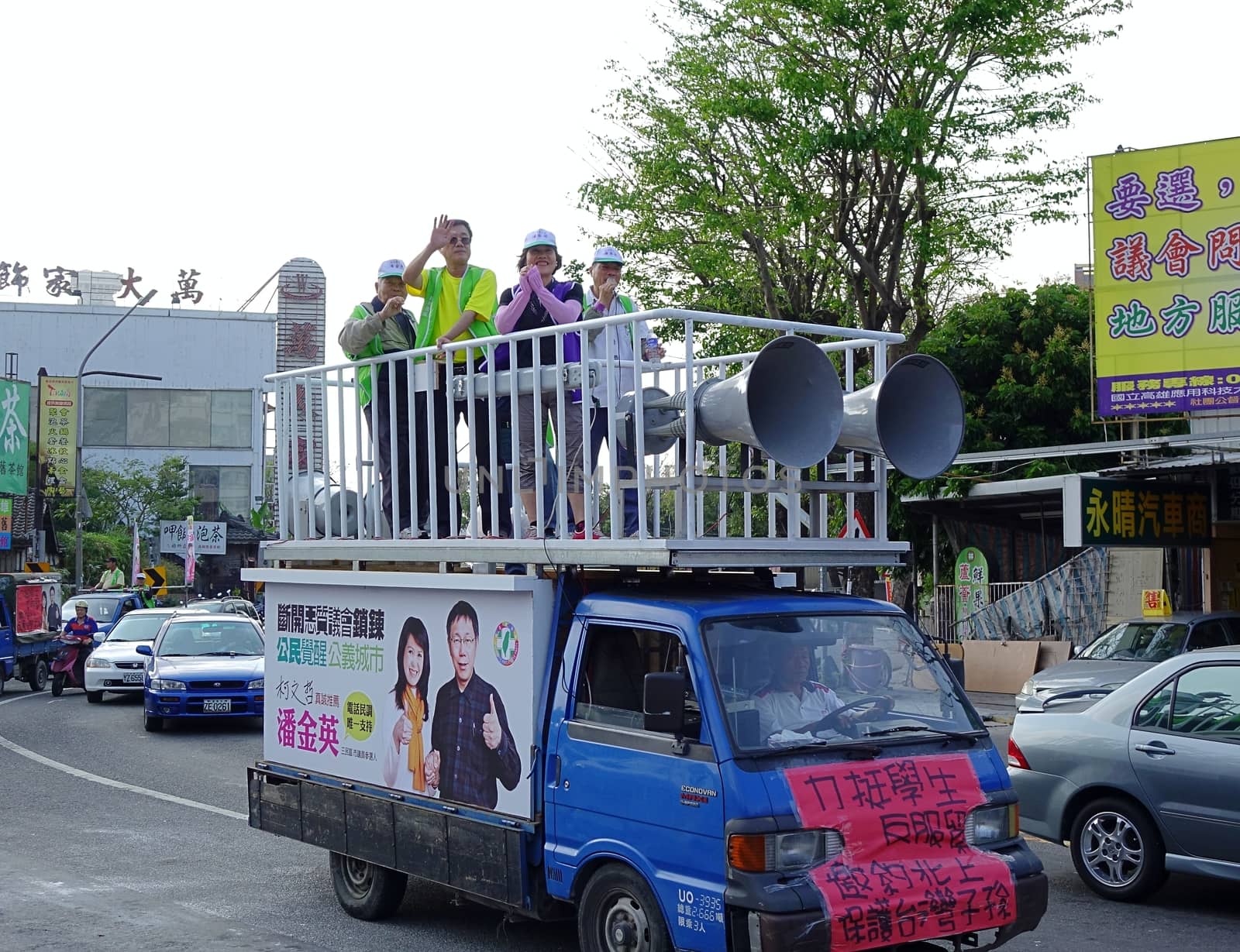 KAOHSIUNG, TAIWAN -- MARCH 29, 2014: City council candidate Pan Jing Ying campaigns in the run up for the 2014 local elections.