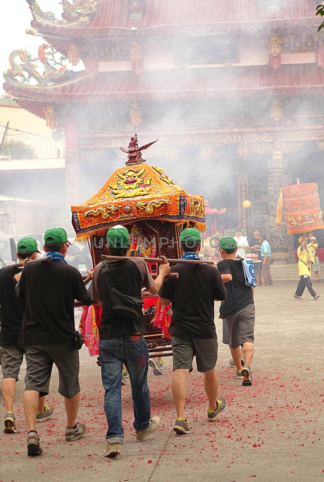 Young Men Carry a Sedan Chair Towards a Temple by shiyali