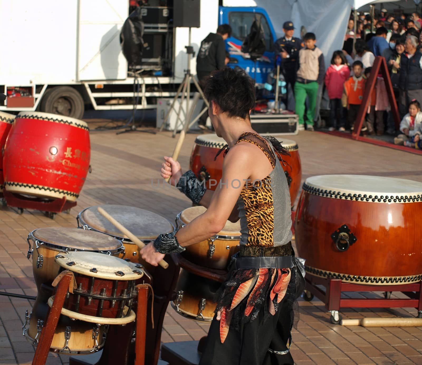 KAOHSIUNG, TAIWAN - JANUARY 23: The Japanese percussion group TenDrum performs outside the Cultural Center for the Chinese New Year on January 23, 2012 in Kaohsiung